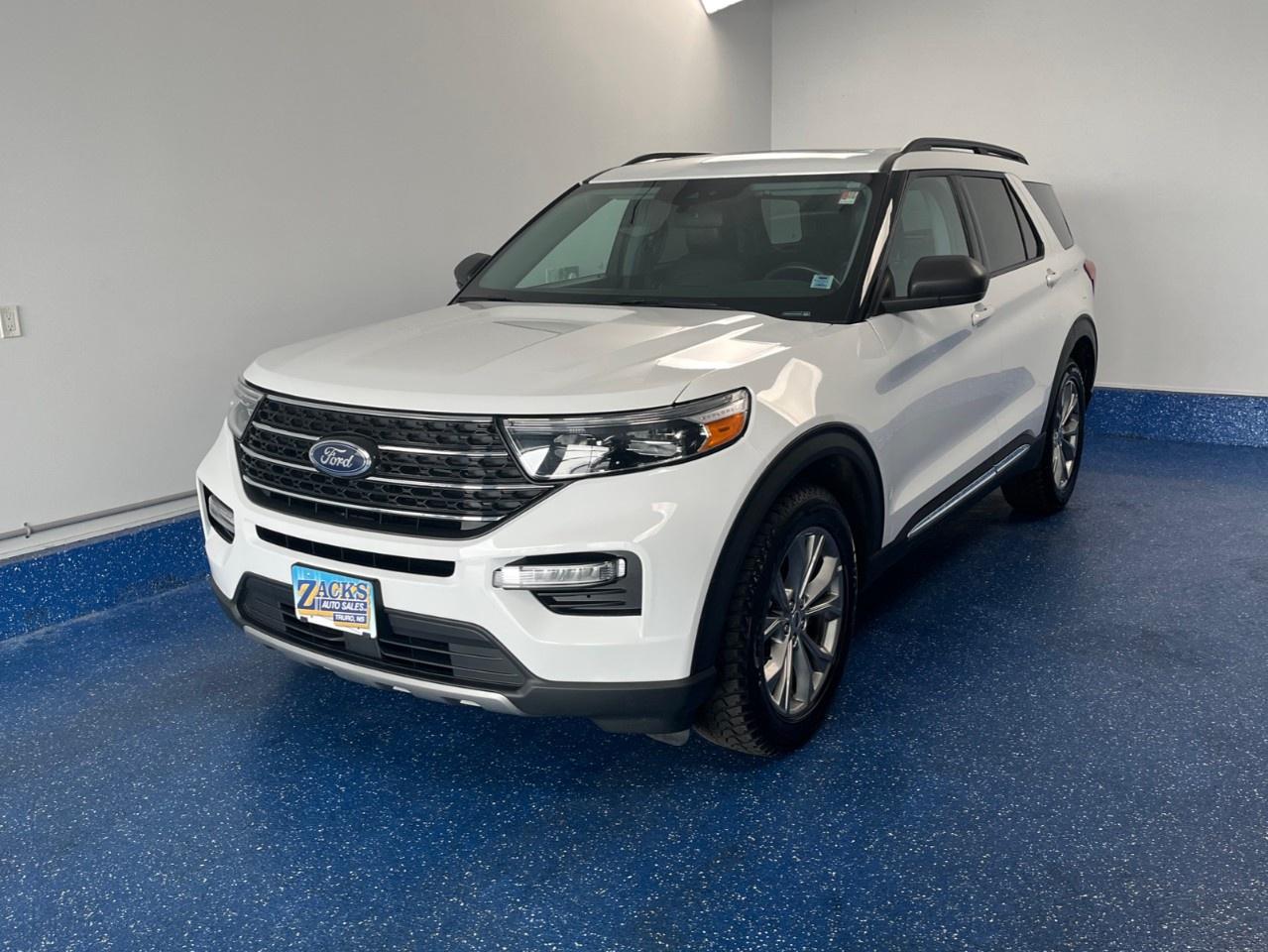 New Price! 2023 Ford Explorer XLT 4WD XLT w/ Leather and Twin Panel Sunroof | Zacks Certified. 10-Speed Automatic 4WD Oxford White 2.3L I4 EcoBoost<br /><br /><br />New Brakes, Dealer Maintained, 4WD, 20''' Premium Painted Aluminum Wheels, AM/FM radio: SiriusXM, AM/FM Stereo, Automatic temperature control, Equipment Group 202A High Package, Exterior Parking Camera Rear, Heated ActiveX Seating Material Captain's Chairs, Heated front seats, Heated Steering Wheel, LED Fog Lamps, Power driver seat, Rear air conditioning, Remote keyless entry, Remote Start System, SecuriCode Keyless Entry Keypad, SYNC 3 Communications & Entertainment System, Tilt steering wheel, Twin Panel Moonroof.<br /><br />Certification Program Details: Fully Reconditioned | Fresh 2 Yr MVI | 30 day warranty* | 110 point inspection | Full tank of fuel | Krown rustproofed | Flexible financing options | Professionally detailed<br /><br />This vehicle is Zacks Certified! You're approved! We work with you. Together we'll find a solution that makes sense for your individual situation. Please visit us or call 902 843-3900 to learn about our great selection.<br /><br />With 22 lenders available Zack's Auto Sales can offer our customers with the lowest available interest rate. Thank you for taking the time to check out our selection!