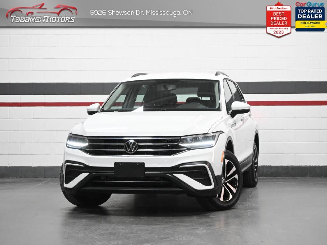 <b>Apple Carplay, Android Auto, Heated Seats, Heated Steering Wheel, Autonomous Emergency Braking, Lane Change System, Keyless Entry! Former Daily Rental!</b><br>  Tabangi Motors is family owned and operated for over 20 years and is a trusted member of the Used Car Dealer Association (UCDA). Our goal is not only to provide you with the best price, but, more importantly, a quality, reliable vehicle, and the best customer service. Visit our new 25,000 sq. ft. building and indoor showroom and take a test drive today! Call us at 905-670-3738 or email us at customercare@tabangimotors.com to book an appointment. <br><hr></hr>CERTIFICATION: Have your new pre-owned vehicle certified at Tabangi Motors! We offer a full safety inspection exceeding industry standards including oil change and professional detailing prior to delivery. Vehicles are not drivable, if not certified. The certification package is available for $595 on qualified units (Certification is not available on vehicles marked As-Is). All trade-ins are welcome. Taxes and licensing are extra.<br><hr></hr><br> <br><iframe width=100% height=350 src=https://www.youtube.com/embed/HScBePzTKOo?si=5mvvdxRmGplxv9jF title=YouTube video player frameborder=0 allow=accelerometer; autoplay; clipboard-write; encrypted-media; gyroscope; picture-in-picture; web-share referrerpolicy=strict-origin-when-cross-origin allowfullscreen></iframe><br><br>   Everything from capacity, capability, comfort, and ease of use was designed with relentless purpose on this 2022 Tiguan. This  2022 Volkswagen Tiguan is fresh on our lot in Mississauga. <br> <br>Whether its a weekend warrior or the daily driver this time, this 2022 Tiguan makes every experience easier to manage. Cutting edge tech, both inside the cabin and under the hood, allow for safe, comfy, and connected rides that keep the whole party going. The crossover of the future is already here, and its called the Tiguan.This  SUV has 63,811 kms. Its  white in colour  . It has a 8 speed automatic transmission and is powered by a  184HP 2.0L 4 Cylinder Engine.  This vehicle has been upgraded with the following features: Air, Rear Air, Tilt, Cruise, Power Windows, Power Locks, Power Mirrors. <br> <br>To apply right now for financing use this link : <a href=https://tabangimotors.com/apply-now/ target=_blank>https://tabangimotors.com/apply-now/</a><br><br> <br/><br>SERVICE: Schedule an appointment with Tabangi Service Centre to bring your vehicle in for all its needs. Simply click on the link below and book your appointment. Our licensed technicians and repair facility offer the highest quality services at the most competitive prices. All work is manufacturer warranty approved and comes with 2 year parts and labour warranty. Start saving hundreds of dollars by servicing your vehicle with Tabangi. Call us at 905-670-8100 or follow this link to book an appointment today! https://calendly.com/tabangiservice/appointment. <br><hr></hr>PRICE: We believe everyone deserves to get the best price possible on their new pre-owned vehicle without having to go through uncomfortable negotiations. By constantly monitoring the market and adjusting our prices below the market average you can buy confidently knowing you are getting the best price possible! No haggle pricing. No pressure. Why pay more somewhere else?<br><hr></hr>WARRANTY: This vehicle qualifies for an extended warranty with different terms and coverages available. Dont forget to ask for help choosing the right one for you.<br><hr></hr>FINANCING: No credit? New to the country? Bankruptcy? Consumer proposal? Collections? You dont need good credit to finance a vehicle. Bad credit is usually good enough. Give our finance and credit experts a chance to get you approved and start rebuilding credit today!<br> o~o