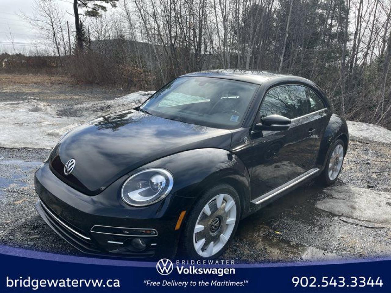 Recent Arrival! Deep Black Pearl Metallic 2019 Volkswagen Beetle Wolfsburg Edition Coupe | Leather | Auto FWD 6-Speed Automatic with Tiptronic 2.0L 4-Cylinder Bridgewater Volkswagen, Located in Bridgewater Nova Scotia.Titan Black Leather, 18 Disc Alloy Wheels, 4-Wheel Disc Brakes, 8 Speakers, ABS brakes, Air Conditioning, Alloy wheels, AM/FM radio: SiriusXM, App-Connect (Android Auto/Apple CarPlay/MirrorLink), Auto-dimming Rear-View mirror, Automatic temperature control, Bi-Xenon Headlights, Brake assist, Bumpers: body-colour, CD player, Delay-off headlights, Diamond Stitched Leather Seating Surfaces, Driver door bin, Driver vanity mirror, Dual front impact airbags, Dual front side impact airbags, Electronic Stability Control, Exterior Parking Camera Rear, Four wheel independent suspension, Front anti-roll bar, Front Bucket Seats, Front dual zone A/C, Front Fog Lights, Front reading lights, Fully automatic headlights, Headlight Range Adjustment, Heated door mirrors, Heated Front Seats, Heated front seats, Heated Front Sport Seats, Illuminated entry, Leather Shift Knob, Leather steering wheel, LED Rear License Plate Illumination, LED Tail Lights, Navigation System, Occupant sensing airbag, Outside temperature display, Overhead console, Panic alarm, Passenger door bin, Passenger vanity mirror, Power door mirrors, Power moonroof, Power steering, Power windows, Radio data system, Radio: 6.33 Touchscreen w/CD Player, Rain sensing wipers, Rear anti-roll bar, Rear window defroster, Remote keyless entry, Rhombus Cloth Seating Surfaces, Speed control, Split folding rear seat, Spoiler, Steering wheel mounted audio controls, Style Package, Tachometer, Telescoping steering wheel, Tilt steering wheel, Traction control, Trip computer, Turn signal indicator mirrors, Variably intermittent wipers, Wheels: 7J x 17 Knoxville Alloy.Volkswagen Certified Details:* Finance rates from 4.99%* Any remaining new-vehicle limited warranty. Certified Pre-Owned vehicles are eligible for extended warranty coverage, giving you greater peace of mind* A 6-month subscription to Volkswagen 24-hour roadside assistance* Prepaid Maintenance is now available for Certified Pre-Owned Volkswagens. Lock in your maintenance fees by choosing between a 2- or 3-year plan. Vehicles up to 7 years of age are eligible for the purchase of our Prepaid Maintenance plans regardless of mileage. A 3-month SiriusXM all-access trial subscription / Recent college, CEGEP or university Graduates can get a $500 rebate / CARFAX Vehicle History Report. A 3-month SiriusXM all-access trial subscription* A completed 112-point inspection plus mechanical and appearance reconditioning assessment performed by a Volkswagen factory-trained technician