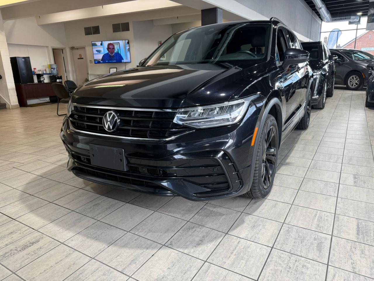 <span style=font-size:14px;><strong>2023 Volkswagen Tiguan R-Line </strong></span><br /><br /><p dir=ltr style=line-height:1.272;margin-top:12pt;margin-bottom:12pt;><span id=docs-internal-guid-4583ab2e-7fff-2b1a-b302-771765065da6><span style=font-size: 11pt; font-family: Arial, sans-serif; font-weight: 700; font-variant-numeric: normal; font-variant-east-asian: normal; font-variant-alternates: normal; font-variant-position: normal; font-variant-emoji: normal; text-decoration-line: underline; text-decoration-skip-ink: none; vertical-align: baseline; white-space-collapse: preserve;>What to Expect at Mid Toronto Auto Sales</span></span></p><ul style=margin-top:0;margin-bottom:0;padding-inline-start:48px;><li aria-level=1 dir=ltr style=list-style-type: disc; font-size: 11pt; font-family: Arial, sans-serif; font-variant-numeric: normal; font-variant-east-asian: normal; font-variant-alternates: normal; font-variant-position: normal; font-variant-emoji: normal; vertical-align: baseline; white-space: pre;><p dir=ltr role=presentation style=line-height:1.272;margin-top:0pt;margin-bottom:0pt;><span id=docs-internal-guid-4583ab2e-7fff-2b1a-b302-771765065da6><span style=font-size: 11pt; font-weight: 700; font-variant-numeric: normal; font-variant-east-asian: normal; font-variant-alternates: normal; font-variant-position: normal; font-variant-emoji: normal; vertical-align: baseline; text-wrap-mode: wrap;>Upfront Pricing: </span><span style=font-size: 11pt; font-variant-numeric: normal; font-variant-east-asian: normal; font-variant-alternates: normal; font-variant-position: normal; font-variant-emoji: normal; vertical-align: baseline; text-wrap-mode: wrap;>No Haggling, No Hassles. We offer our best price upfront for a transparent and stress-free car buying experience.</span></span></p></li><li aria-level=1 dir=ltr style=list-style-type: disc; font-size: 11pt; font-family: Arial, sans-serif; font-variant-numeric: normal; font-variant-east-asian: normal; font-variant-alternates: normal; font-variant-position: normal; font-variant-emoji: normal; vertical-align: baseline; white-space: pre;><p dir=ltr role=presentation style=line-height:1.272;margin-top:0pt;margin-bottom:0pt;><span id=docs-internal-guid-4583ab2e-7fff-2b1a-b302-771765065da6><span style=font-size: 11pt; font-weight: 700; font-variant-numeric: normal; font-variant-east-asian: normal; font-variant-alternates: normal; font-variant-position: normal; font-variant-emoji: normal; vertical-align: baseline; text-wrap-mode: wrap;>Peace of Mind: </span><span style=font-size: 11pt; font-variant-numeric: normal; font-variant-east-asian: normal; font-variant-alternates: normal; font-variant-position: normal; font-variant-emoji: normal; vertical-align: baseline; text-wrap-mode: wrap;>Enjoy a 7-Day or 300 Km Exchange Policy (details available upon request) for added confidence in your purchase</span><span style=font-size: 11pt; font-weight: 700; font-variant-numeric: normal; font-variant-east-asian: normal; font-variant-alternates: normal; font-variant-position: normal; font-variant-emoji: normal; vertical-align: baseline; text-wrap-mode: wrap;>.</span></span></p></li><li aria-level=1 dir=ltr style=list-style-type: disc; font-size: 11pt; font-family: Arial, sans-serif; font-variant-numeric: normal; font-variant-east-asian: normal; font-variant-alternates: normal; font-variant-position: normal; font-variant-emoji: normal; vertical-align: baseline; white-space: pre;><p dir=ltr role=presentation style=line-height:1.272;margin-top:0pt;margin-bottom:0pt;><span id=docs-internal-guid-4583ab2e-7fff-2b1a-b302-771765065da6><span style=font-size: 11pt; font-weight: 700; font-variant-numeric: normal; font-variant-east-asian: normal; font-variant-alternates: normal; font-variant-position: normal; font-variant-emoji: normal; vertical-align: baseline; text-wrap-mode: wrap;>Safety Guaranteed: </span><span style=font-size: 11pt; font-variant-numeric: normal; font-variant-east-asian: normal; font-variant-alternates: normal; font-variant-position: normal; font-variant-emoji: normal; vertical-align: baseline; text-wrap-mode: wrap;>All vehicles exceed Ontario safety standards through our comprehensive reconditioning process.</span></span></p></li><li aria-level=1 dir=ltr style=list-style-type: disc; font-size: 11pt; font-family: Arial, sans-serif; font-variant-numeric: normal; font-variant-east-asian: normal; font-variant-alternates: normal; font-variant-position: normal; font-variant-emoji: normal; vertical-align: baseline; white-space: pre;><p dir=ltr role=presentation style=line-height:1.272;margin-top:0pt;margin-bottom:0pt;><span id=docs-internal-guid-4583ab2e-7fff-2b1a-b302-771765065da6><span style=font-size: 11pt; font-weight: 700; font-variant-numeric: normal; font-variant-east-asian: normal; font-variant-alternates: normal; font-variant-position: normal; font-variant-emoji: normal; vertical-align: baseline; text-wrap-mode: wrap;>Family-Friendly Focus: </span><span style=font-size: 11pt; font-variant-numeric: normal; font-variant-east-asian: normal; font-variant-alternates: normal; font-variant-position: normal; font-variant-emoji: normal; vertical-align: baseline; text-wrap-mode: wrap;>We'll help you find the perfect car to fit your family's needs and budget</span><span style=font-size: 11pt; font-weight: 700; font-variant-numeric: normal; font-variant-east-asian: normal; font-variant-alternates: normal; font-variant-position: normal; font-variant-emoji: normal; vertical-align: baseline; text-wrap-mode: wrap;>.</span></span></p></li><li aria-level=1 dir=ltr style=list-style-type: disc; font-size: 11pt; font-family: Arial, sans-serif; font-variant-numeric: normal; font-variant-east-asian: normal; font-variant-alternates: normal; font-variant-position: normal; font-variant-emoji: normal; vertical-align: baseline; white-space: pre;><p dir=ltr role=presentation style=line-height:1.272;margin-top:0pt;margin-bottom:0pt;><span id=docs-internal-guid-4583ab2e-7fff-2b1a-b302-771765065da6><span style=font-size: 11pt; font-weight: 700; font-variant-numeric: normal; font-variant-east-asian: normal; font-variant-alternates: normal; font-variant-position: normal; font-variant-emoji: normal; vertical-align: baseline; text-wrap-mode: wrap;>Flexible Financing: </span><span style=font-size: 11pt; font-variant-numeric: normal; font-variant-east-asian: normal; font-variant-alternates: normal; font-variant-position: normal; font-variant-emoji: normal; vertical-align: baseline; text-wrap-mode: wrap;>Explore our Flexible low-rate financing solutions (On Approved Credit). Pre-approval applications are welcome.</span></span></p></li><li aria-level=1 dir=ltr style=list-style-type: disc; font-size: 11pt; font-family: Arial, sans-serif; font-variant-numeric: normal; font-variant-east-asian: normal; font-variant-alternates: normal; font-variant-position: normal; font-variant-emoji: normal; vertical-align: baseline; white-space: pre;><p dir=ltr role=presentation style=line-height:1.272;margin-top:0pt;margin-bottom:12pt;><span id=docs-internal-guid-4583ab2e-7fff-2b1a-b302-771765065da6><span style=font-size: 11pt; font-weight: 700; font-variant-numeric: normal; font-variant-east-asian: normal; font-variant-alternates: normal; font-variant-position: normal; font-variant-emoji: normal; vertical-align: baseline; text-wrap-mode: wrap;>Industry-Leading Warranties: </span><span style=font-size: 11pt; font-variant-numeric: normal; font-variant-east-asian: normal; font-variant-alternates: normal; font-variant-position: normal; font-variant-emoji: normal; vertical-align: baseline; text-wrap-mode: wrap;>Get peace of mind with our exceptional warranty and coverage options,</span></span></p></li></ul><span id=docs-internal-guid-4583ab2e-7fff-2b1a-b302-771765065da6><span style=font-size: 11pt; font-family: Arial, sans-serif; font-weight: 700; font-variant-numeric: normal; font-variant-east-asian: normal; font-variant-alternates: normal; font-variant-position: normal; font-variant-emoji: normal; text-decoration-line: underline; text-decoration-skip-ink: none; vertical-align: baseline; white-space-collapse: preserve;>Please Call 416-840-3292 or e-mail us for More info. We Look Forward to Your Visit At 2401 Dufferin St, Toronto, M6E 3S7. </span><a href=http://www.midtorontoautosales.com/ style=text-decoration-line: none;><span style=font-size: 11pt; font-family: Arial, sans-serif; color: rgb(17, 85, 204); font-weight: 700; font-variant-numeric: normal; font-variant-east-asian: normal; font-variant-alternates: normal; font-variant-position: normal; font-variant-emoji: normal; text-decoration-line: underline; text-decoration-skip-ink: none; vertical-align: baseline; white-space-collapse: preserve;>www.midtorontoautosales.com</span></a></span><br /><br /><br /> <strong>AMAZING Google Reviews!! </strong><a href=https://www.google.com/search?q=mid+toronto+auto+sales&rlz=1C1RXQR_en&oq=mid+toronto+&aqs=chrome.0.0i355i457i512j46i175i199i512j69i57j46i175i199i512j0i22i30j69i60l3.3013j0j7&sourceid=chrome&ie=UTF-8#lrd=0x882b335f7de0ff9b:0x87dd46c2ad07327d,1,,,><strong>Click here for our reviews!</strong></a><br /><br /><span style=font-size:14px;><strong>Mid Toronto Auto Sales Promises and Commitments to Valuable Customers.</strong></span><br /><ul><li><strong>Extensive Financing Options: </strong>Partnering with over 20 financial institutions, we offer competitive rates for all credit situations, from good to bad credit, including those with past financial challenges like consumer proposals and bankruptcies<strong>.</strong></li><li><strong>Transparent Pricing: </strong>Our prices are updated regularly to reflect current market conditions, saving you time and eliminating the need for extensive negotiations<strong>.</strong></li><li><strong>Competitive Pricing: </strong>We strive for competitive pricing. Compare our offers to other dealerships and discover the Mid Toronto Auto Sales advantage<strong>.</strong></li><li><strong>Peace of Mind: </strong>Enjoy a 7-Day or 300 Km Exchange Policy (details available upon request) for added confidence in your purchase<strong>.</strong></li><li><strong>Financing Focus</strong>: Please note that the advertised prices are based on financed purchases. A surcharge of $500 will apply to cash, draft, money order, certified check, etc., to mitigate the risk of fraudulent transactions and prevent non-retail purchases.</li><li><strong>Onsite Credit Expertise: </strong>Our in-house credit specialists can quickly assess your application, regardless of your credit history. We also offer affiliate debt reduction assistance.</li><li><strong>Convenient Location: </strong>Located on Dufferin Street, just minutes from Yorkdale Mall, we are easily accessible to car buyers throughout the Greater Toronto Area (GTA)<strong>.</strong></li><li><strong>Multilingual Support: </strong>We are proud to serve a diverse clientele and offer support in multiple languages, including Portuguese, Spanish, and Italian.</li><li><strong>IAG Partnership: </strong>As a member of the International Auto Group, we leverage the expertise and resources of renowned dealerships such as Yorkdale Ford Lincoln, Formula Ford Lincoln, Weston Ford, Pickering Jeep Chrysler, Scarborough Mitsubishi, and Coventry North Jaguar Land Rover.</li><li><strong>Disclaimer: While we strive for accuracy, errors or omissions may occur. Please verify all information with Mid Toronto Auto Sales directly</strong></li></ul>