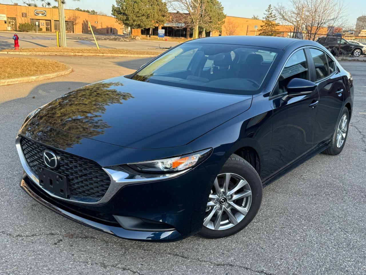 LOW LOW KMS**CERTIFIED* * *BLUETOOTH* *BACKUP CAMERA*<div><br></div><div>| Next day delivery available | Carproof Verified Clean Title Car</div><div><br></div><div>Year: 2024</div><div>Make: Mazda </div><div>Model:  Mazda 3</div><div>Kms: 33,329</div><div>Price: 23,880$</div><div><br></div><div>Sport empire cars </div><div>Don’t miss your chance of getting into this gorgeous sedan. Up for sale is the eye catching 2024 mazda3 with only 33,320 KMS!! For the low price of $23,880+HST and licensing. Vehicle is being sold SAFETY CERTIFIED§!!! Professionally detailed safety certified ready to go! Car is equipped with numerous attractive features such as back up camera, heated seats, push button start, active SENSE and many more!! Perfect combination of reliability, comfort</div><div><br></div><div>JM1BPABM6R1708755</div>