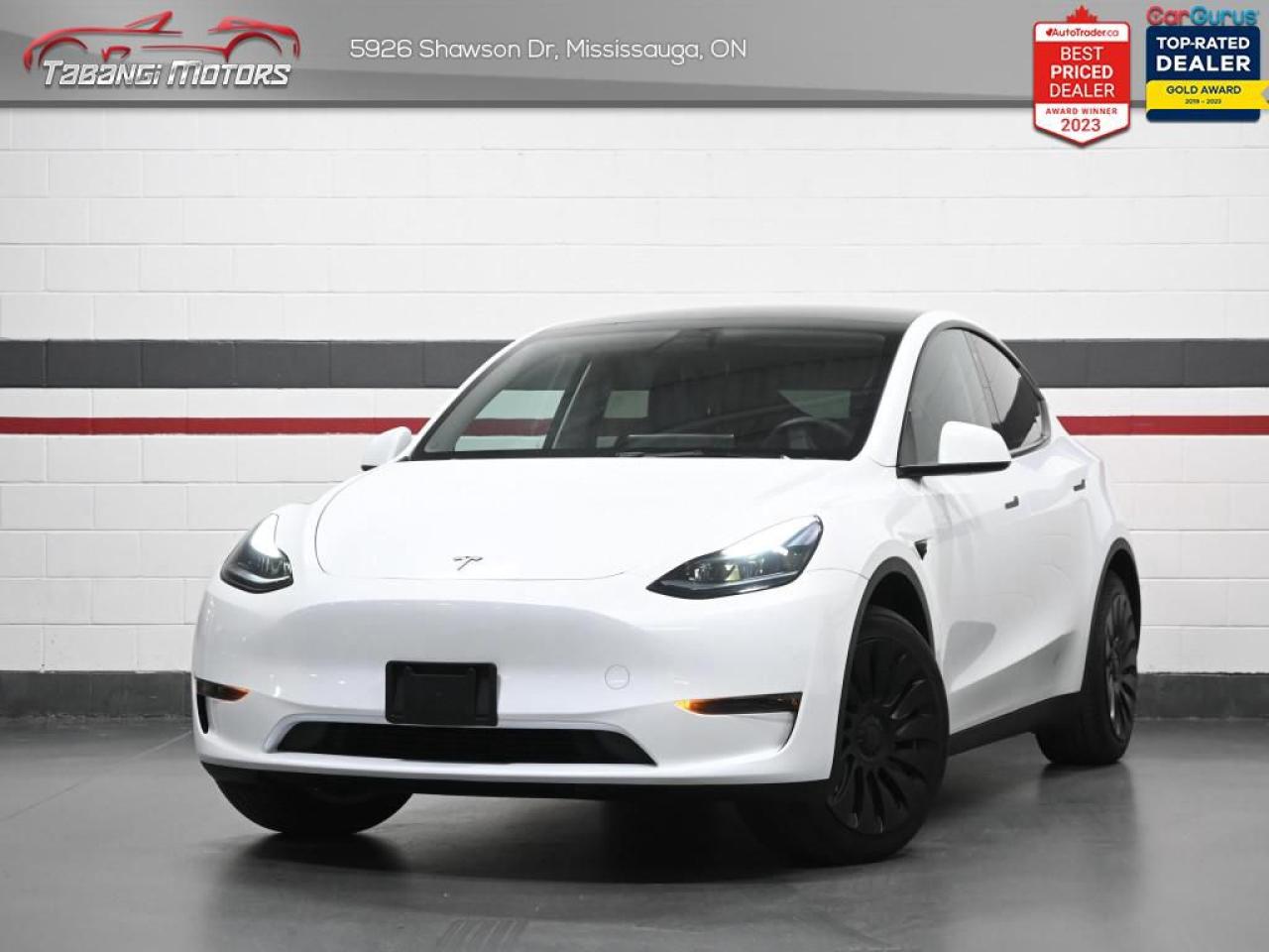 <b>Navigation, Glass Roof, Lane Departure Warning, Forward Collision Warning, Heated Steering Wheel, Front & Rear Heated Seats, Netflix, Disney+, YouTube supported & Much more! </b><br>  Tabangi Motors is family owned and operated for over 20 years and is a trusted member of the Used Car Dealer Association (UCDA). Our goal is not only to provide you with the best price, but, more importantly, a quality, reliable vehicle, and the best customer service. Visit our new 25,000 sq. ft. building and indoor showroom and take a test drive today! Call us at 905-670-3738 or email us at customercare@tabangimotors.com to book an appointment. <br><hr></hr>CERTIFICATION: Have your new pre-owned vehicle certified at Tabangi Motors! We offer a full safety inspection exceeding industry standards including oil change and professional detailing prior to delivery. Vehicles are not drivable, if not certified. The certification package is available for $595 on qualified units (Certification is not available on vehicles marked As-Is). All trade-ins are welcome. Taxes and licensing are extra.<br><hr></hr><br> <br><iframe width=100% height=350 src=https://www.youtube.com/embed/F_9U5jc92ao?si=86Tabpk2sbI670uO title=YouTube video player frameborder=0 allow=accelerometer; autoplay; clipboard-write; encrypted-media; gyroscope; picture-in-picture; web-share referrerpolicy=strict-origin-when-cross-origin allowfullscreen></iframe><br><br><br>   This 2023 Model Y is an extremely versatile and capable mid-size electric SUV. This  2023 Tesla Model Y is fresh on our lot in Mississauga. <br> <br>This 2023 Tesla Model Y is engineered to masterfully blend efficient EV driving dynamics with unparalleled versatility, capability, and protection. The exterior styling features fluid and minimalist body lines with exemplary aerodynamic design, to create an overall attractive package. The interior space is a tech-lovers dream, loaded with cutting-edge connectivity and infotainment systems, in addition to well-built interior panels and premium trim materials.This  SUV has 44,415 kms. Its  white in colour  . It has an automatic transmission and is powered by a  Single Motor: Rear AC Permanent Magnet Synchronous engine.  This vehicle has been upgraded with the following features: Air, Rear Air, Tilt, Cruise, Power Windows, Power Locks, Power Mirrors. <br> <br>To apply right now for financing use this link : <a href=https://tabangimotors.com/apply-now/ target=_blank>https://tabangimotors.com/apply-now/</a><br><br> <br/><br>SERVICE: Schedule an appointment with Tabangi Service Centre to bring your vehicle in for all its needs. Simply click on the link below and book your appointment. Our licensed technicians and repair facility offer the highest quality services at the most competitive prices. All work is manufacturer warranty approved and comes with 2 year parts and labour warranty. Start saving hundreds of dollars by servicing your vehicle with Tabangi. Call us at 905-670-8100 or follow this link to book an appointment today! https://calendly.com/tabangiservice/appointment. <br><hr></hr>PRICE: We believe everyone deserves to get the best price possible on their new pre-owned vehicle without having to go through uncomfortable negotiations. By constantly monitoring the market and adjusting our prices below the market average you can buy confidently knowing you are getting the best price possible! No haggle pricing. No pressure. Why pay more somewhere else?<br><hr></hr>WARRANTY: This vehicle qualifies for an extended warranty with different terms and coverages available. Dont forget to ask for help choosing the right one for you.<br><hr></hr>FINANCING: No credit? New to the country? Bankruptcy? Consumer proposal? Collections? You dont need good credit to finance a vehicle. Bad credit is usually good enough. Give our finance and credit experts a chance to get you approved and start rebuilding credit today!<br> o~o