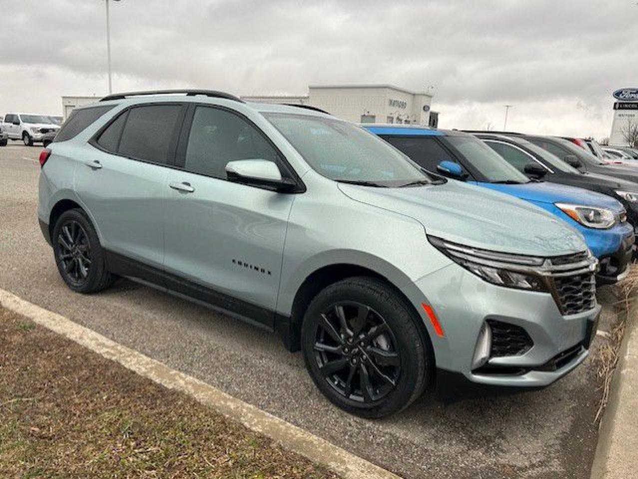 <p>The **2022 Chevrolet Equinox RS 1.5T AWD** is a bold and stylish compact SUV that offers a dynamic blend of performance</p>
<p> delivering both a fun-to-drive experience and the versatility needed for everyday life.

Under the hood</p>
<p> producing smooth acceleration and impressive fuel economy. Paired with a **6-speed automatic transmission** and equipped with **all-wheel drive (AWD)**</p>
<p> from city streets to light off-road adventures.

The **RS trim** adds a sportier edge to the Equinox with its **blacked-out accents**</p>
<p> as well as a **power-adjustable drivers seat** for personalized comfort. The **8-inch touchscreen infotainment system** includes **Apple CarPlay**</p>
<p> ensuring seamless connectivity to all your favorite apps and media.

The **2022 Equinox RS 1.5T AWD** also comes equipped with a range of advanced safety features</p>
<p> the **2022 Chevrolet Equinox RS 1.5T AWD** is an ideal choice for drivers who want an SUV thats both practical and fun to drive. Whether youre commuting through the city</p>
<p> and capability.


REASONS TO BUY FROM WATFORD FORD


Best Price First.

Tired of negotiating? No problem! No hassle</p>
<p> best price from the start. Guaranteed!

Brake pads for life.

Receive free brake pads for life of your vehicle when you do all your regular service at Watford Ford.

First oil change covered.

Return to Watford Ford for your complimentary first oil change with your New or Used vehicle.

1 year road hazard tire protection.

Nails</p>
<p> potholes?no worries. $250 coverage per tire for any road hazards.

Secure-guard theft protection.

Four thousand dollars ($4</p>
<p> in the event that your Vehicle is stolen and not recovered and deemed to be a total loss

**Our goal is to maintain 100% accuracy on our listings. However</p>
<p> mistakes may still occur. Please contact us to confirm details**


**ONE KEY POLICY: All used cars come standard with One Key. In instances where the vehicle came with 2 Keys</p>
<a href=http://www.watfordford.com/used/Chevrolet-Equinox-2022-id12014012.html>http://www.watfordford.com/used/Chevrolet-Equinox-2022-id12014012.html</a>