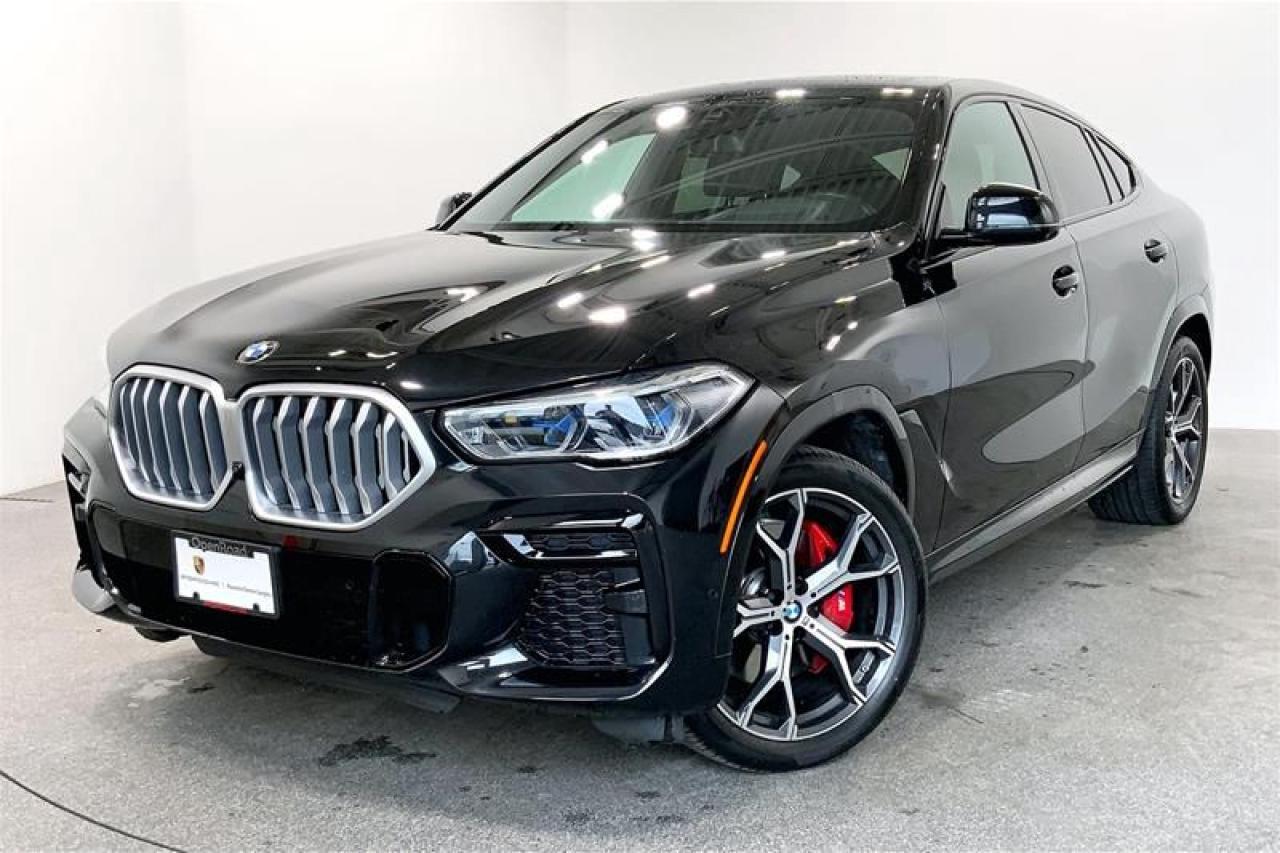 Welcoming this Luxurious 2022 BMW X6 xDrive40i in Black Sapphire Metallic with a Black Perforated Vernasca Leather Interior. This vehicle comes highly equipped with Premium Enhanced Package, M Sport Package, Adaptive M Suspension, Carbon Fibre Trim, Harman/Kardon Sound System, Ventilated Seats, Head-Up Display, Illuminated Kidney Grille, BMW Laserlight Headlights, High-Gloss Black Window Surround, and much more! This Local BC Vehicle has One Previous Owner! We Accept All Trade-Ins and Buy-Ins!! For more details or to schedule a test drive with one of our highly trained sales executives please call or send a website enquiry now before it is gone. 604-530-8911. Porsche Center Langley has won the prestigious Porsche Premier Dealer Award eight years in a row. We are centrally located just a short distance from Highway 1 in beautiful Langley, British Columbia. Our hope is to have you driving your dream vehicle soon. Please note that additional fees, including a $599 documentation fee & a $690 dealer prep fee, apply to all pre-owned vehicles. Dealer #40136