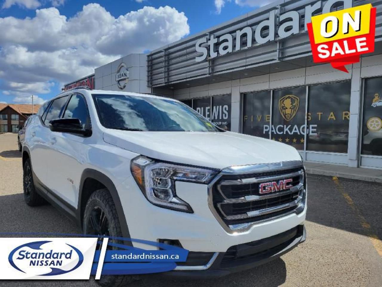 <b>5 STAR PKG<br></b><br>   Compare at $32998 - Our Price is just $31201! <br> <br>   Sleek style, effortless capability, and a design motif of usability, this 2022 Terrain shows you what Professional Grade means. This  2022 GMC Terrain is for sale today in Swift Current. <br> <br>This 2022 GMC Terrain shows that Professional Grade is more than an idea, its a way of life. From endless details that relentlessly improve the SUVs usability, to striking style, and amazing capability, this 2022 Terrain is exactly what you expect from a GMC SUV. The interior has a clean design, with upscale materials like soft-touch surfaces and premium trim. Quiet, spacious and comfortable, this Terrain is exactly what youd expect from the Professional Grade SUV. For the next step in the evolution of the crossover and small SUV segment, dont miss this GMC Terrain. This  SUV has 72,042 kms. Its  white frost tricoat in colour  . It has a 9 speed automatic transmission and is powered by a  170HP 1.5L 4 Cylinder Engine. <br> <br> Our Terrains trim level is AT4. Upgrading to this off-road ready Terrain AT4 is an awesome decision as it comes loaded with leather front seats with memory settings, a large colour touchscreen infotainment system featuring wireless Apple CarPlay, Android Auto and SiriusXM plus its also 4G LTE hotspot capable. This Terrain AT4 also includes an off-road skid plate, dark exterior accents, gloss black aluminum wheels and exclusive interior accents, power rear liftgate, a leather-wrapped steering wheel, Teen Driver technology, a remote engine starter, an HD rear vision camera, lane keep assist with lane departure warning, forward collision alert, LED signature lighting, StabiliTrak with hill decent control, power driver and passenger seats and a 60/40 split-folding rear seat to make hauling larger items a breeze. This vehicle has been upgraded with the following features: Leather Seats,  Power Liftgate,   Remote Start,  Aluminum Wheels,  Lane Keep Assist,  Forward Collision Alert,  Rear View Camera. <br> <br>To apply right now for financing use this link : <a href=https://www.standardnissan.ca/finance/apply-for-financing/ target=_blank>https://www.standardnissan.ca/finance/apply-for-financing/</a><br><br> <br/><br>Why buy from Standard Nissan in Swift Current, SK? Our dealership is owned & operated by a local family that has been serving the automotive needs of local clients for over 110 years! We rely on a reputation of fair deals with good service and top products. With your support, we are able to give back to the community. <br><br>Every retail vehicle new or used purchased from us receives our 5-star package:<br><ul><li>*Platinum Tire & Rim Road Hazzard Coverage</li><li>**Platinum Security Theft Prevention & Insurance</li><li>***Key Fob & Remote Replacement</li><li>****$20 Oil Change Discount For As Long As You Own Your Car</li><li>*****Nitrogen Filled Tires</li></ul><br>Buyers from all over have also discovered our customer service and deals as we deliver all over the prairies & beyond!#BetterTogether o~o