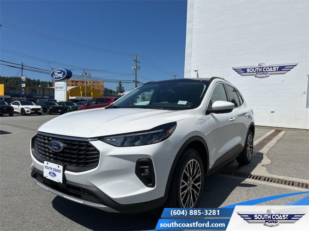 <b>Sunroof, Hybrid, Class II Trailer Tow Package!</b><br> <br> In the city or in the forest, this Ford Escape is built to get you over any terrain with confidence and comfort. <br> <br>This Ford Escape was built for an active lifestyle and offers plenty of options for you to hit the road in your own individual style. Whether you need a family SUV for soccer practice, a capable adventure vehicle, or both, the versatile Ford Escape has you covered. Built for those who live on the go, the 2025 Ford Escape is made to be unstoppable.<br> <br>This Star White Metallic Tri-Coat SUV has a CVT transmission and is powered by a 210HP 2.5L 4 Cylinder Engine. <br> <br> Our Escapes trim level is PHEV. With an extremely efficient yet potent plug-in hybrid powertrain with fast charging, this Escape PHEV features heated front seats with ActiveX synthetic leather upholstery, a heated leatherette steering wheel, adaptive cruise control, remote engine start, and an upgraded 13.2-inch infotainment system now with an integrated navigation system, along with wireless Apple CarPlay and Android Auto. Safety technology also receives an upgrade, with reverse parking sensors, intersection assist and evasive steering assist, along with blind spot monitoring, lane departure warning with lane keeping assist, front and rear collision mitigation, and driver monitoring alert. Additional features include power heated side mirrors, front fog lamps, roof rack rails, and so much more. This vehicle has been upgraded with the following features: Sunroof, Hybrid, Class II Trailer Tow Package.<br><br> View the original window sticker for this vehicle with this url <b><a href=http://www.windowsticker.forddirect.com/windowsticker.pdf?vin=1FMCU0E19SUB26402 target=_blank>http://www.windowsticker.forddirect.com/windowsticker.pdf?vin=1FMCU0E19SUB26402</a></b>.<br> <br>To apply right now for financing use this link: <a href=https://www.southcoastford.com/financing/ target=_blank>https://www.southcoastford.com/financing/</a><br><br> <br/><br> Buy this vehicle now for the lowest bi-weekly payment of <b>$386.81</b> with $0 down for 84 months @ 7.99% APR O.A.C. ( taxes included, $695 Administration Fee included    / Total Obligation of $64628  ).  See dealer for details. <br> <br>Call South Coast Ford Sales or come visit us in person. Were convenient to Sechelt, BC and located at 5606 Wharf Avenue. and look forward to helping you with your automotive needs. <br><br> Come by and check out our fleet of 20+ used cars and trucks and 90+ new cars and trucks for sale in Sechelt.  o~o