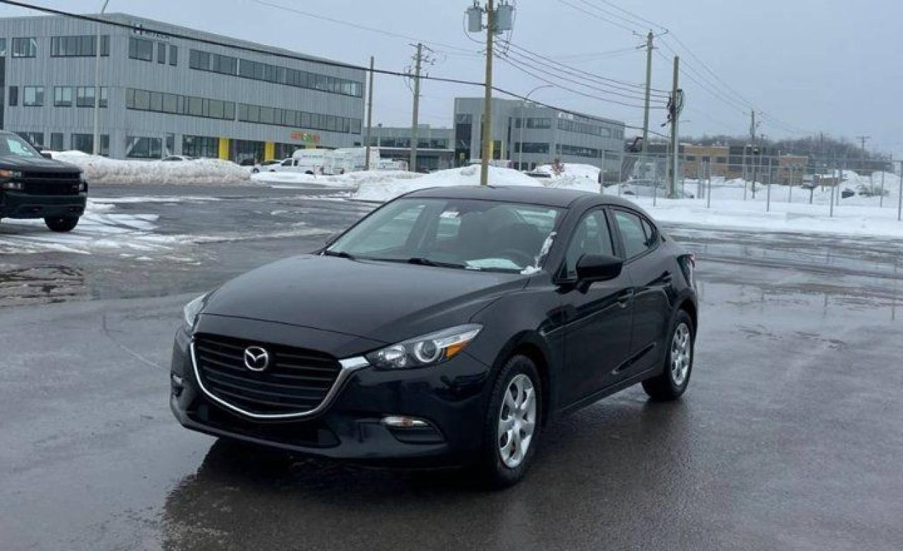 Check out this certified 2018 Mazda Mazda3 GXSedan | Auto | A/C | Bluetooth | Rear Camera | Cruise | Power Group | and More !. Its Automatic transmission and 2.0 L engine will keep you going. This Mazda Mazda3 features the following options: Reverse Camera, Air Conditioning, Bluetooth, Tilt Steering Wheel, Steering Radio Controls, Power Windows, Power Locks, Cruise Control, Traction Control, and Power Mirrors. Stop by and visit us at Mark Wilsons Better Used Cars, 5055 Whitelaw Road, Guelph, ON N1H 6J4.60+ years of World Class Service!450+ Live Market Priced VEHICLES! ONE MASSIVE LOCATION!Free Local Delivery Available!FINANCING! - Better than bank rates! 6 Months No Payments available on approved credit OAC. Zero Down Available. We have expert licensed credit specialists to secure the best possible rate for you and keep you on budget ! We are your financing broker, let us do all the leg work on your behalf! Click the RED Apply for Financing button to the right to get started or drop in today!BAD CREDIT APPROVED HERE! - You dont need perfect credit to get a vehicle loan at Mark Wilsons Better Used Cars! We have a dedicated licensed team of credit rebuilding experts on hand to help you get the car of your dreams!WE LOVE TRADE-INS! - Top dollar trade-in values!SELL us your car even if you dont buy ours! HISTORY: Free Carfax report included.Certification included! No shady fees for safety!EXTENDED WARRANTY: Available30 DAY WARRANTY INCLUDED: 30 Days, or 3,000 km (mechanical items only). No Claim Limit (abuse not covered)5 Day Exchange Privilege! *(Some conditions apply)CASH PRICES SHOWN: Excluding HST and Licensing Fees.2019 - 2024 vehicles may be daily rentals. Please inquire with your Salesperson.We have made every reasonable attempt to ensure options are correct but please verify with your sales professional