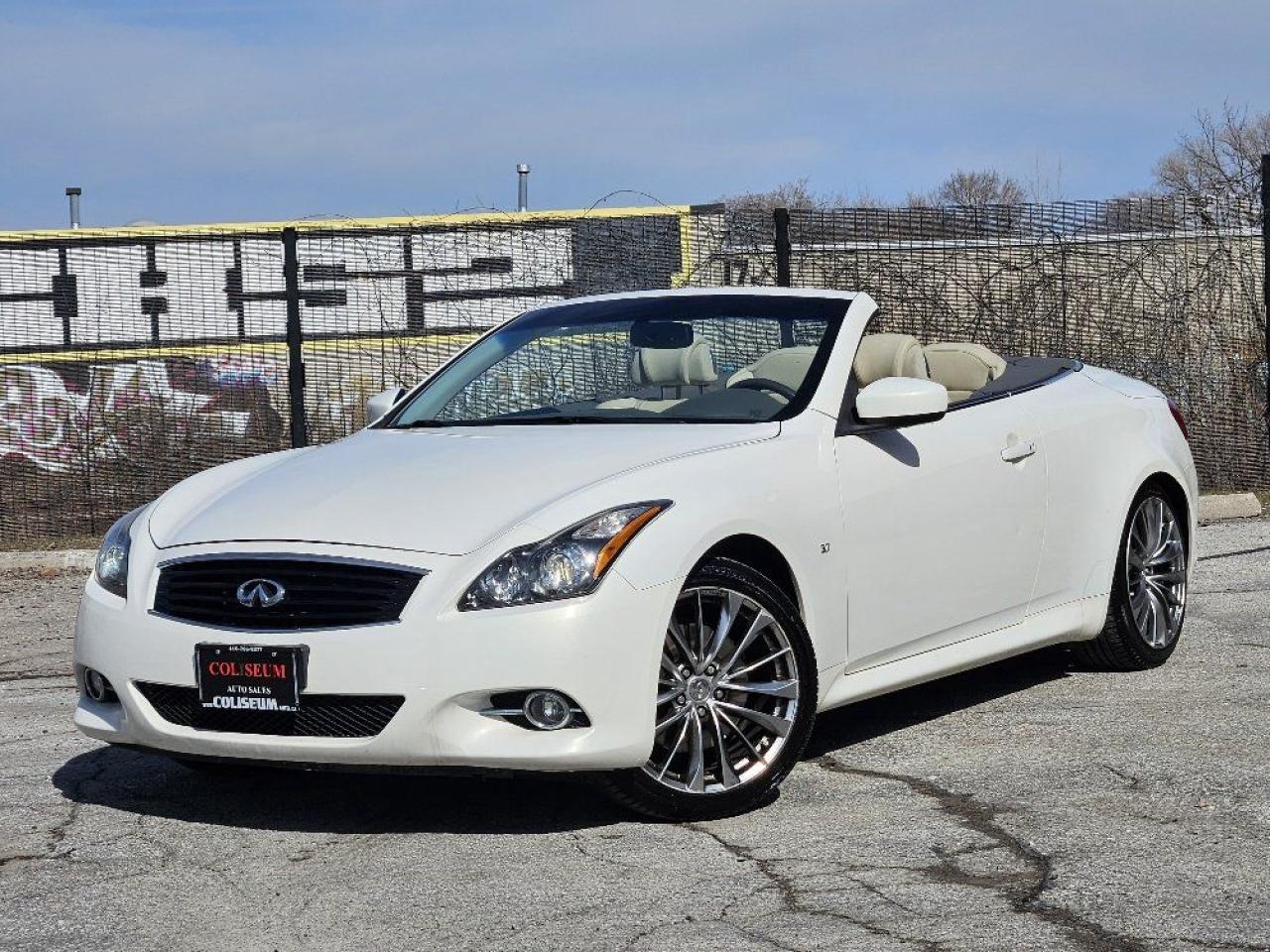 <p>Summers CallingAnswer in Style!</p><p>Turn heads and drop the top in this 2014 Infiniti Q60 Convertible Sporta sleek, pearl white beauty with an ivory wheat stone leather interior that screams luxury. With 330 horsepower under the hood, a 7-speed automatic transmission, and rear-wheel drive, this coupe-turned-convertible delivers an exhilarating ride whether youre cruising city streets or chasing sunsets on the open road.</p><p>This Canadian car has 115,000 km and comes fully loaded with the Tech Package, Navigation, and premium features designed for a first-class summer experience. The power retractable hardtop transforms the look in seconds, while the Bose Open-Air Audio System with 13 speakers ensures every song feels like a private concert. Adaptive climate control keeps you cool no matter the forecast, and heated and ventilated leather seats provide year-round comfort. A rearview camera and parking sensors make every maneuver effortless, while Bluetooth connectivity and voice-activated navigation keep you connected and on track for your next adventure.</p><p>Whether youre chasing the horizon or just want to turn every drive into an experience, this Q60 Convertible is ready. Summer doesnt last forevermake the most of it.</p><p>{ CERTIFIED PRE-OWNED }</p><p>**THIS VEHICLE COMES FULLY CERTIFIED WITH A SAFETY CERTIFICATE & SERVICED AT NO EXTRA COST**</p><p>**$0 DOWN...PRIME RATE FINANCING APPROVALS**o.a.c.</p><p>WE CAN FINANCE INTERNATIONAL STUDENTS, NEW IMMIGRANTS, WORK PERMITS, #9 SIN, AND PR RESIDENTS!</p><p>#BEST DEAL IN TOWN! WHY PAY MORE ANYWHERE ELSE?</p><p>FINANCING & EXTENDED WARRANTIES AVAILABLE ON ALL VEHICLES! WE GUARANTEE ALL VEHICLES & WELCOME FRANCHISE DEALER INSPECTIONS BEFORE PURCHASE, GIVING YOU TOTAL PEACE OF MIND!</p><p>COLISEUM AUTO SALES PROUDLY SERVING THE CUSTOMERS FOR OVER 25 YEARS! NOW WITH 2 LOCATIONS TO SERVE YOU BETTER. COME IN FOR A TEST DRIVE TODAY!<br>FOR ALL FAMILY LUXURY VEHICLES..SUVS..AND SEDANS PLEASE VISIT....</p><p>COLISEUM AUTO SALES ON WESTON<br>301 WESTON ROAD<br>TORONTO, ON M6N 3P1<br>4 1 6 - 7 6 6 - 2 2 7 7</p>