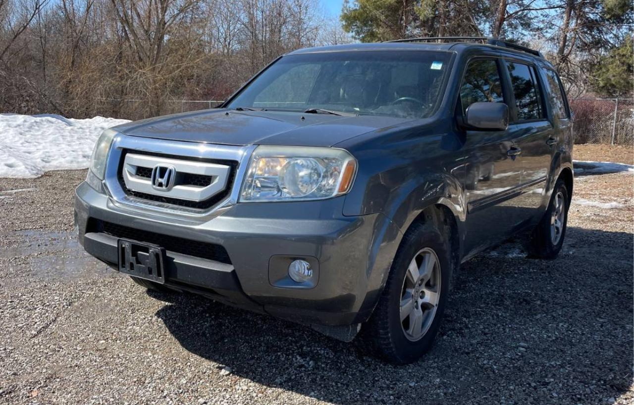 <p>Looking for a spacious and reliable SUV that can handle anything you throw at it? Look no further than this 2010 Honda Pilot EX-L from 613 Rides. This grey beauty boasts a powerful 3.5L V6 engine and a smooth automatic transmission, making it perfect for both city driving and highway adventures. With 199,897 km on the odometer, this Pilot has proven itself as a true workhorse, ready for many more miles of adventures.</p><p>Step inside and experience the luxurious comfort of the EX-L trim. The leather seats are heated and offer power adjustments for both the driver and front passenger, ensuring a comfortable ride for everyone. The premium sound system keeps you entertained with your favorite tunes, while the sunroof allows you to enjoy the sunshine on those bright days. Stay connected with Bluetooth connectivity for hands-free calling and music streaming.</p><p>This Pilot is loaded with features designed to enhance your driving experience. Enjoy the convenience of heated mirrors, keyless entry, and a rearview camera for added safety. The spacious interior features a folding rear seat that allows you to easily adjust the cargo space to suit your needs. Whether youre hauling the family or embarking on a road trip, this 2010 Honda Pilot EX-L from 613 Rides has everything you need.</p><p><strong>Here are five of this Pilots most sizzling features:</strong></p><ul><li><strong>Heated Leather Seats:</strong> Experience ultimate comfort year-round with heated leather seats for both the driver and front passenger.</li><li><strong>Power Adjustable Seats:</strong> Find your perfect driving position with power adjustments for both driver and front passenger seats.</li><li><strong>Premium Sound System:</strong> Enjoy crisp, clear sound on every drive with the Pilots premium sound system.</li><li><strong>Sunroof:</strong> Let the sunshine in and enjoy the open air with the Pilots sunroof.</li><li><strong>Rearview Camera:</strong> Drive with confidence and peace of mind with the added safety feature of a rearview camera.</li></ul><p><em>Powered by AutoIntelligence™ AI</em></p>