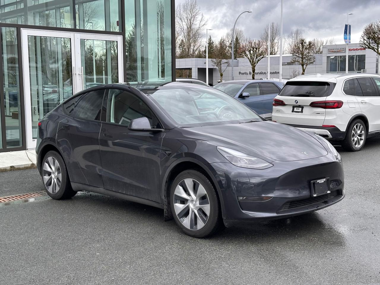 <p><strong>2024 Tesla Model Y</strong><strong>7 Passenger</strong></p>

<p>Panoramic Roof, Dual - AC, AM\FM Radio, Anti-Lock Brakes, Drive Train - All Wheel, Leatherette, Power Driver and Passenger Seats, Seat Type - Bucket, Heated Seats - All, Air Bag - Single, Air Bag - Dual, Power Steering, Power Locks, Power Windows, Cruise Control, Traction Control, Navigational System, Memory Seat, On Star, Bluetooth, Power Liftgate, Back-up Camera, Adjustable Steering Wheel, Rear Defrost, Rain Sensor Windshield</p>

<p>All Abbotsford Hyundai pre-owned vehicles come complete with the remaining Manufacturers Warranty plus a vehicle safety report and a CarFax history report. Abbotsford Hyundai is a BBB accredited pre-owned car dealership, serving the Fraser Valley and our friends in Surrey, Langley and surrounding Lower Mainland areas. We are your Friendly Fraser Valley car dealer. We are located at 30250 Automall Drive in Abbotsford. Call or email us to schedule a test drive.</p>

<p><em>*All Sales are subject to Taxes, $699 Doc fee</em></p>