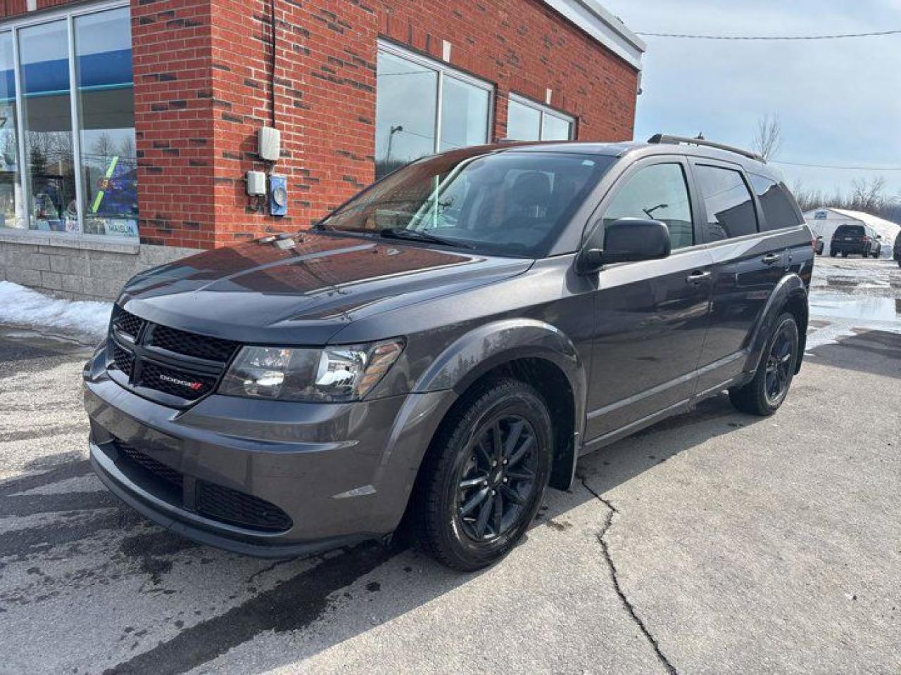 Come see this certified 2020 Dodge Journey SE w/ Blacktop PKG | 7 Passenger | 17 Black Alloys | Parking Sensors | TouchScreen | LOW KM ! . Its Automatic transmission and 2.4 L engine will keep you going. This Dodge Journey comes equipped with these options: Touch Screen, Parking Sensors, Air Conditioning, 7 Passenger, 17 Alloy Wheels, Tilt Steering Wheel, Steering Radio Controls, Power Windows, Power Locks, and Traction Control. Stop by and visit us at Mark Wilsons Better Used Cars, 5055 Whitelaw Road, Guelph, ON N1H 6J4.60+ years of World Class Service!450+ Live Market Priced VEHICLES! ONE MASSIVE LOCATION!Free Local Delivery Available!FINANCING! - Better than bank rates! 6 Months No Payments available on approved credit OAC. Zero Down Available. We have expert licensed credit specialists to secure the best possible rate for you and keep you on budget ! We are your financing broker, let us do all the leg work on your behalf! Click the RED Apply for Financing button to the right to get started or drop in today!BAD CREDIT APPROVED HERE! - You dont need perfect credit to get a vehicle loan at Mark Wilsons Better Used Cars! We have a dedicated licensed team of credit rebuilding experts on hand to help you get the car of your dreams!WE LOVE TRADE-INS! - Top dollar trade-in values!SELL us your car even if you dont buy ours! HISTORY: Free Carfax report included.Certification included! No shady fees for safety!EXTENDED WARRANTY: Available30 DAY WARRANTY INCLUDED: 30 Days, or 3,000 km (mechanical items only). No Claim Limit (abuse not covered)5 Day Exchange Privilege! *(Some conditions apply)CASH PRICES SHOWN: Excluding HST and Licensing Fees.2019 - 2024 vehicles may be daily rentals. Please inquire with your Salesperson.