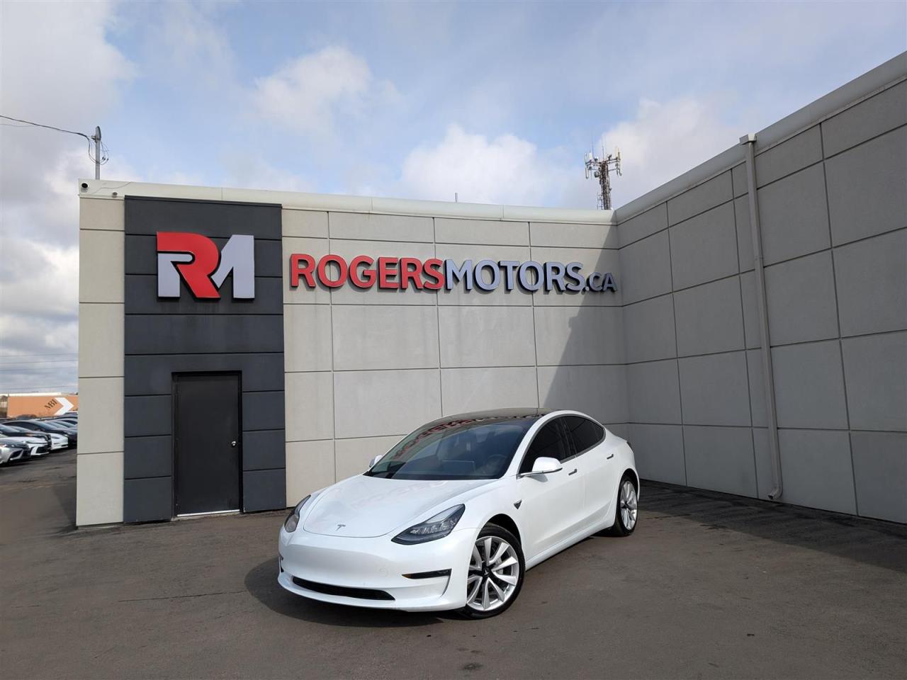 Photo of White 2019 Tesla Model 3
