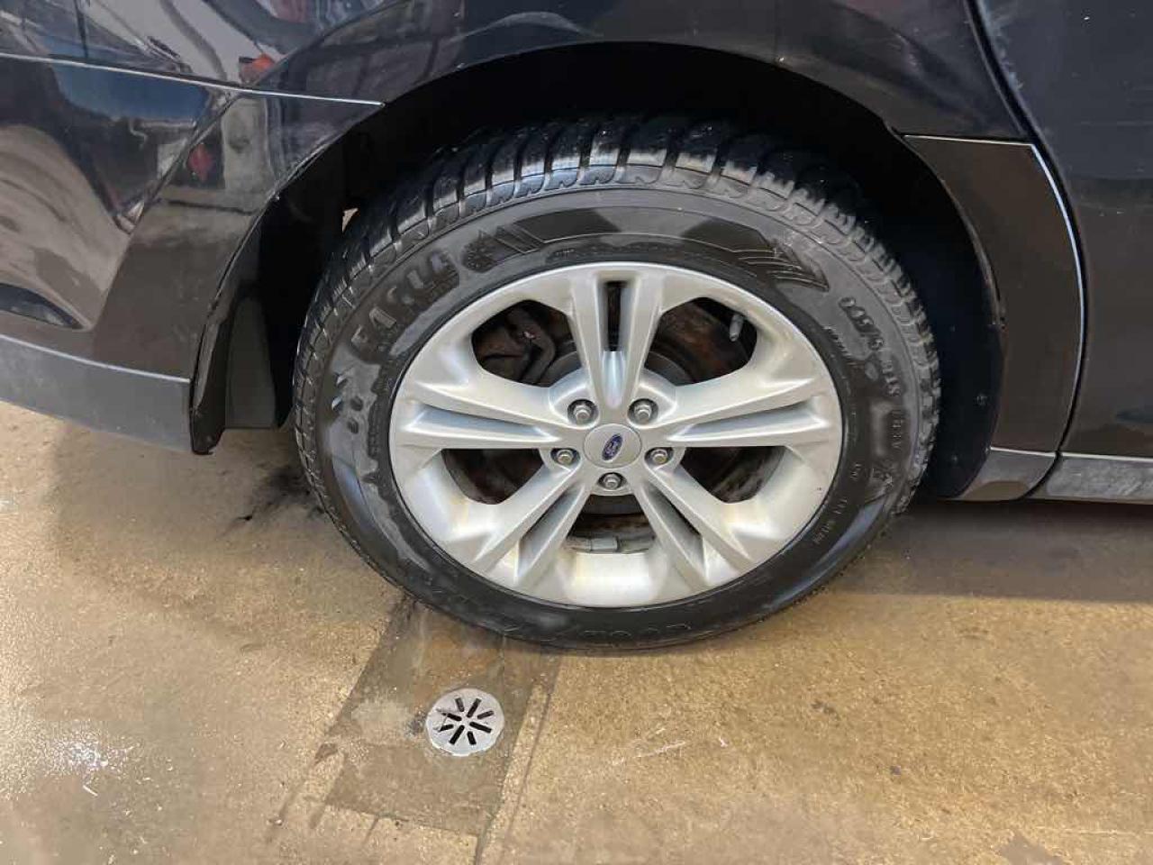 12356571