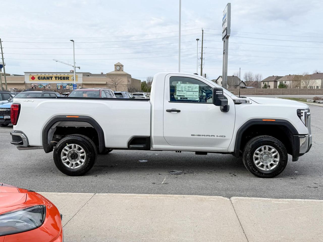 2025 GMC Sierra 2500 HD Pro 6.6L V8 WITH REMOTE ENTRY, HITCH GUIDANCE, HD REAR VISION CAMERA, APPLE CARPLAY AND ANDROID AUTO, SNOW PLOW PREP/CAMPER PACKAGE Photo