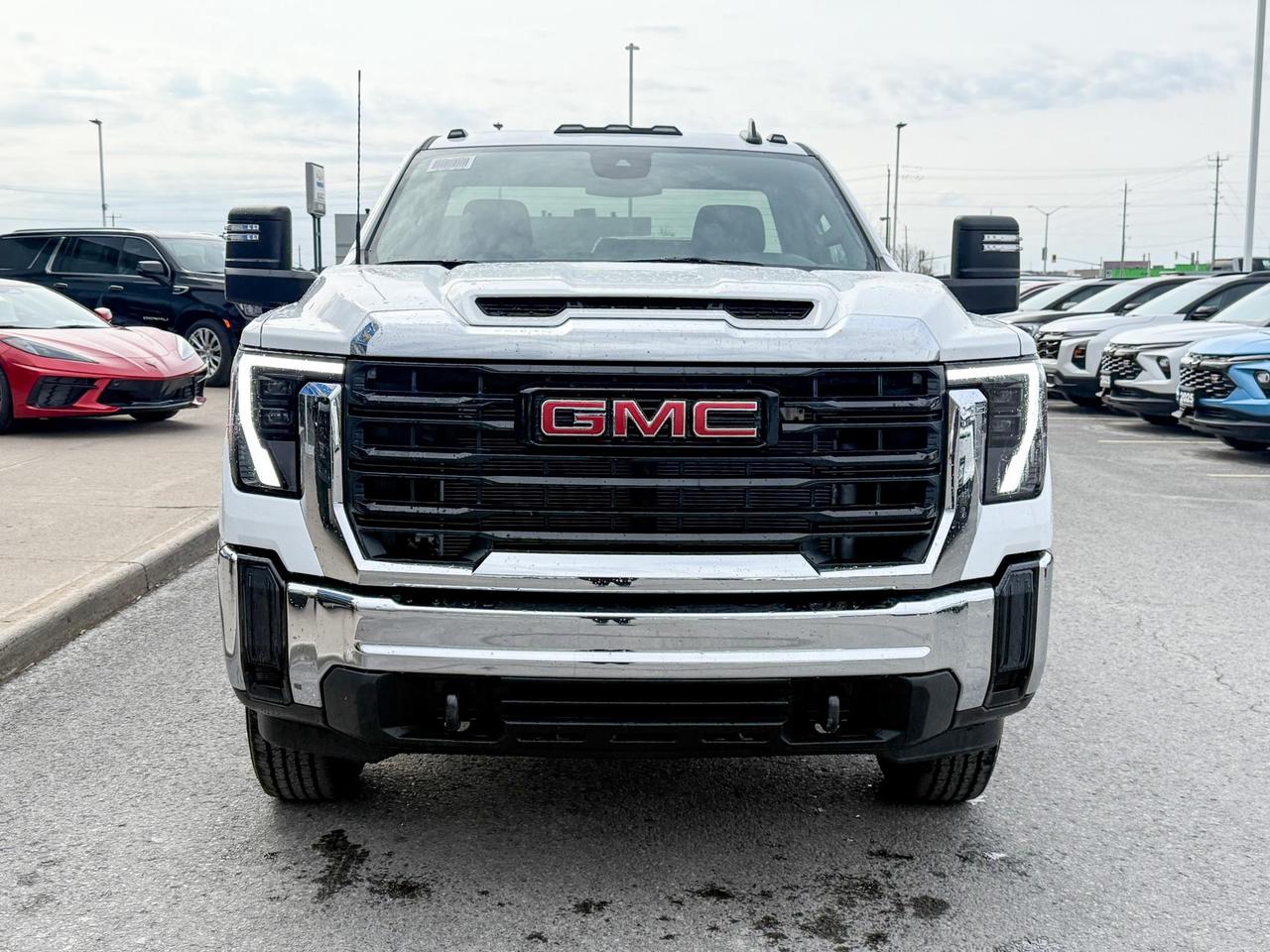 2025 GMC Sierra 2500 HD Pro 6.6L V8 WITH REMOTE ENTRY, HITCH GUIDANCE, HD REAR VISION CAMERA, APPLE CARPLAY AND ANDROID AUTO, SNOW PLOW PREP/CAMPER PACKAGE Photo