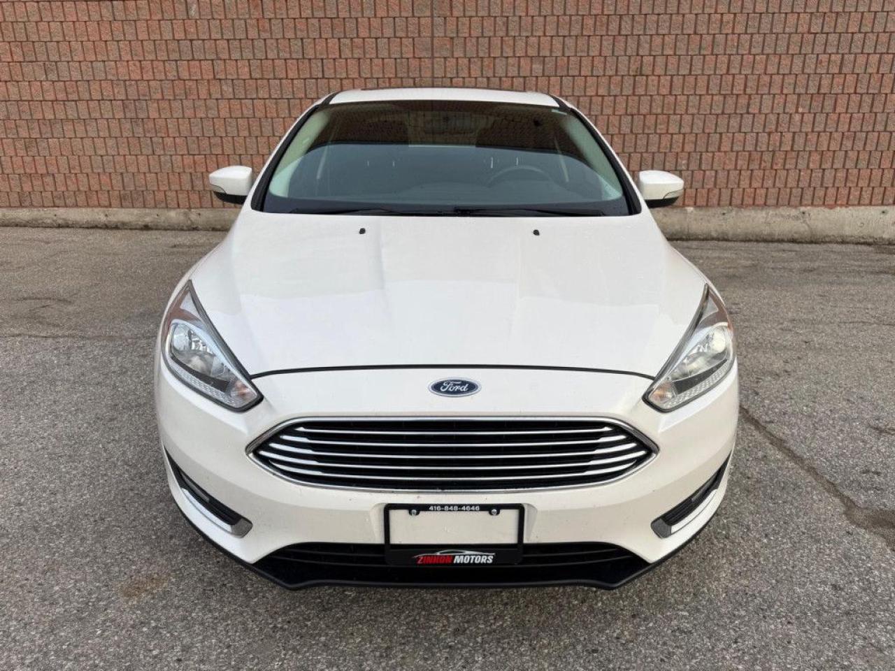 2016 Ford Focus TITANIUM | ONE-OWNER | LEATHER | BACK-UP CAM | NAVI | SUNROOF | PUSH BUTTON START | - Photo #9