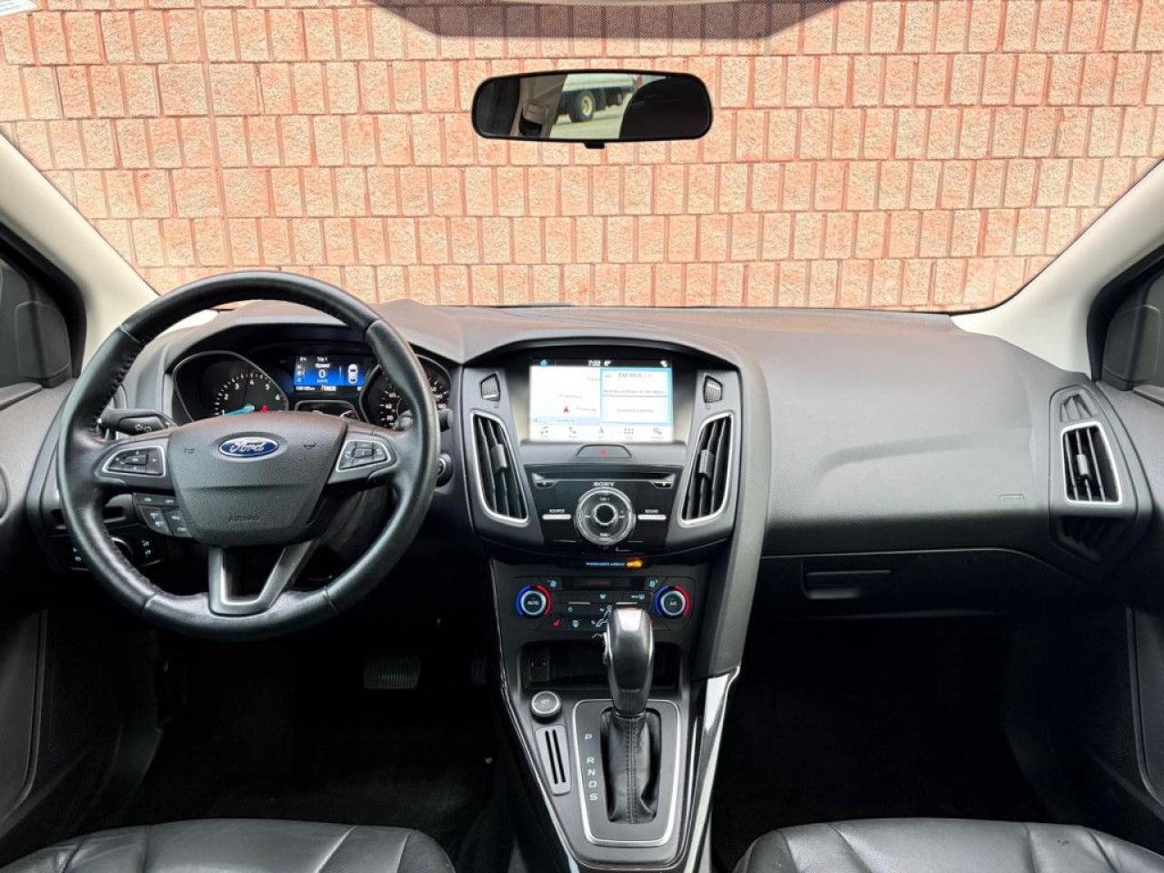 2016 Ford Focus TITANIUM | ONE-OWNER | LEATHER | BACK-UP CAM | NAVI | SUNROOF | PUSH BUTTON START | - Photo #15