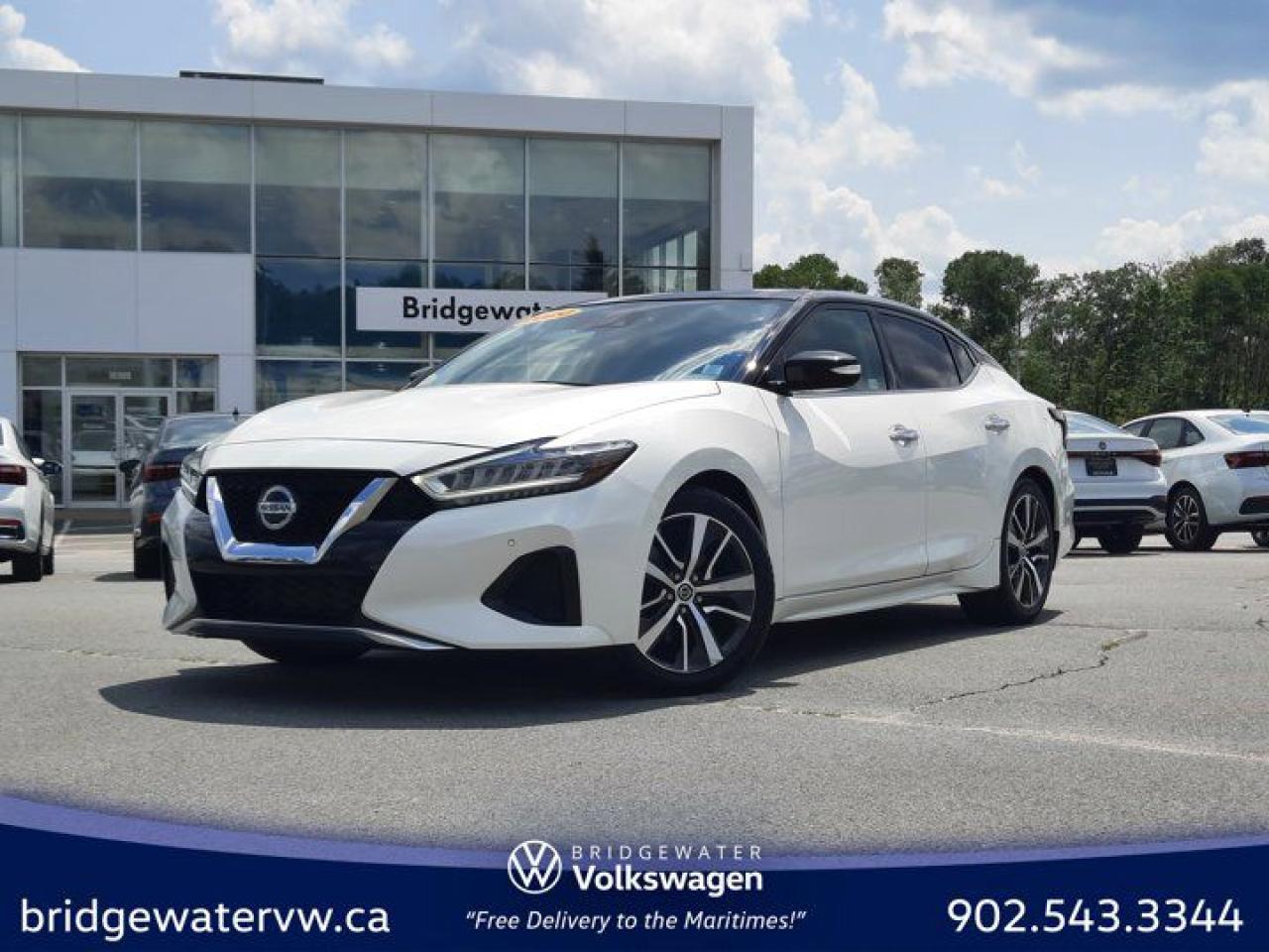 Awards:* JD Power Canada Automotive Performance, Execution and Layout (APEAL) Study, Initial Quality Study (IQS) * ALG Canada Residual Value Awards New Price! Recent Arrival! White 2020 Nissan Maxima 3.5 SL Apple CarPlay | Android Auto | Sirus XM FWD CVT with Xtronic 3.5L V6 DOHC 24V Bridgewater Volkswagen, Located in Bridgewater Nova Scotia.11 Speakers, 4-Wheel Disc Brakes, ABS brakes, Air Conditioning, Alloy wheels, AM/FM radio: SiriusXM, Auto High-beam Headlights, Auto-dimming Rear-View mirror, Automatic temperature control, Blind Spot Warning, Block heater, Brake assist, Bumpers: body-colour, CD player, Compass, Delay-off headlights, Driver door bin, Driver vanity mirror, Dual front impact airbags, Dual front side impact airbags, Electronic Stability Control, Four wheel independent suspension, Front anti-roll bar, Front Bucket Seats, Front dual zone A/C, Front reading lights, Full Tank of Fuel & Floor Mats, Fully automatic headlights, Garage door transmitter: HomeLink, Heated door mirrors, Heated front seats, Heated Front Zero Gravity Seats, Heated rear seats, Heated steering wheel, Illuminated entry, Knee airbag, Leather-Appointed Seat Trim, Low tire pressure warning, Navigation System, NissanConnect featuring Apple CarPlay and Android Auto, Occupant sensing airbag, Outside temperature display, Overhead airbag, Overhead console, Panic alarm, Passenger door bin, Passenger vanity mirror, Power door mirrors, Power driver seat, Power moonroof, Power passenger seat, Power steering, Power windows, Radio data system, Radio: AM/FM/CD Audio w/NissanConnect Navigation, Rear anti-roll bar, Rear reading lights, Rear side impact airbag, Rear window defroster, Remote keyless entry, Security system, Speed control, Speed-sensing steering, Speed-Sensitive Wipers, Split folding rear seat, Sport steering wheel, Steering wheel mounted audio controls, Tachometer, Telescoping steering wheel, Tilt steering wheel, Traction control, Trip computer, Turn signal indicator mirrors, Variably intermittent wipers, Wheels: 18 Machined Aluminum Alloy.Certification Program Details: 150 Points Inspection Fresh Oil Change Free Carfax Full Detail 2 years MVI Full Tank of Gas The 150+ point inspection includes: Engine Instrumentation Interior components Pre-test drive inspections The test drive Service bay inspection Appearance Final inspection