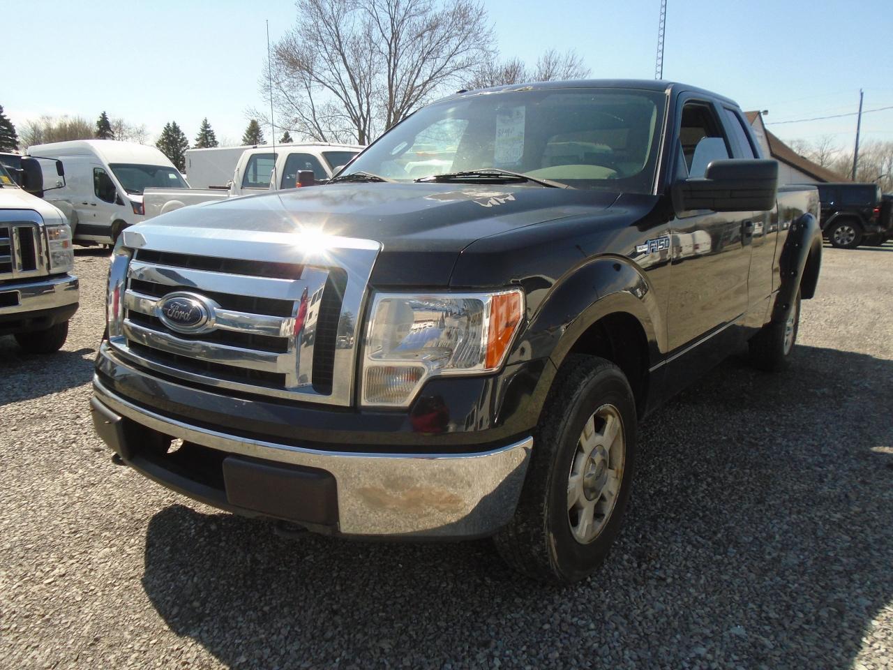 2010 Ford F-150 4WD SuperCab 145  XLT - Photo #1