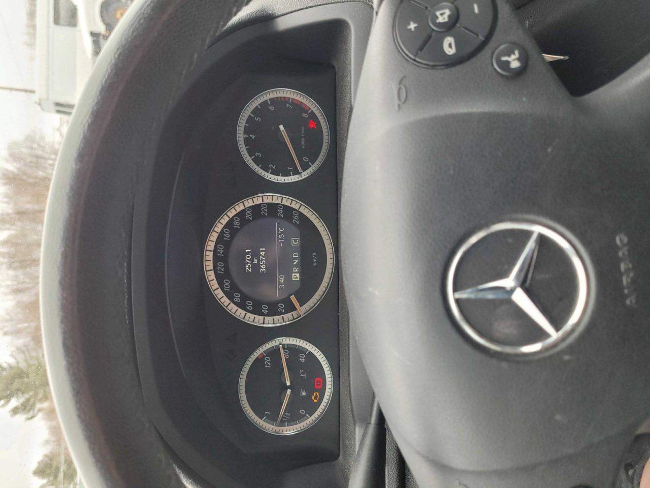12387816