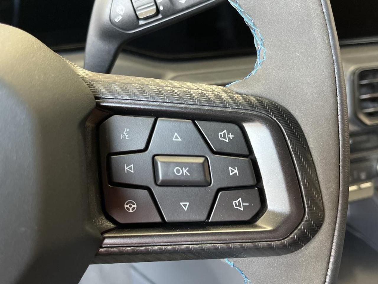 12388566