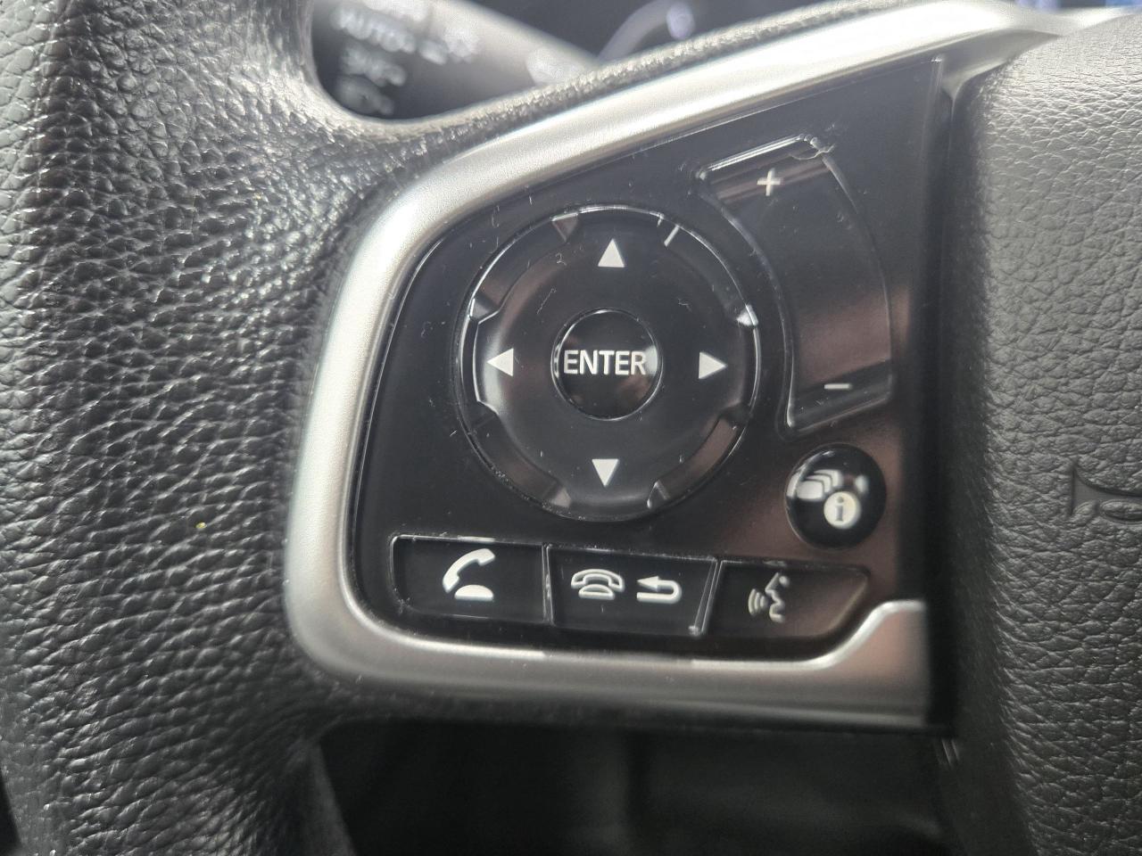 12395721
