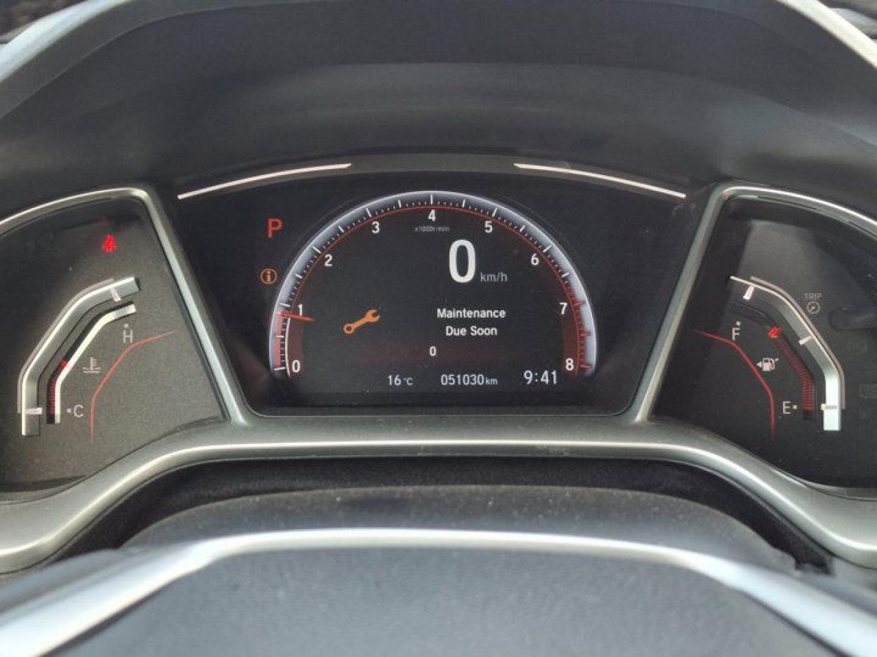 12396765