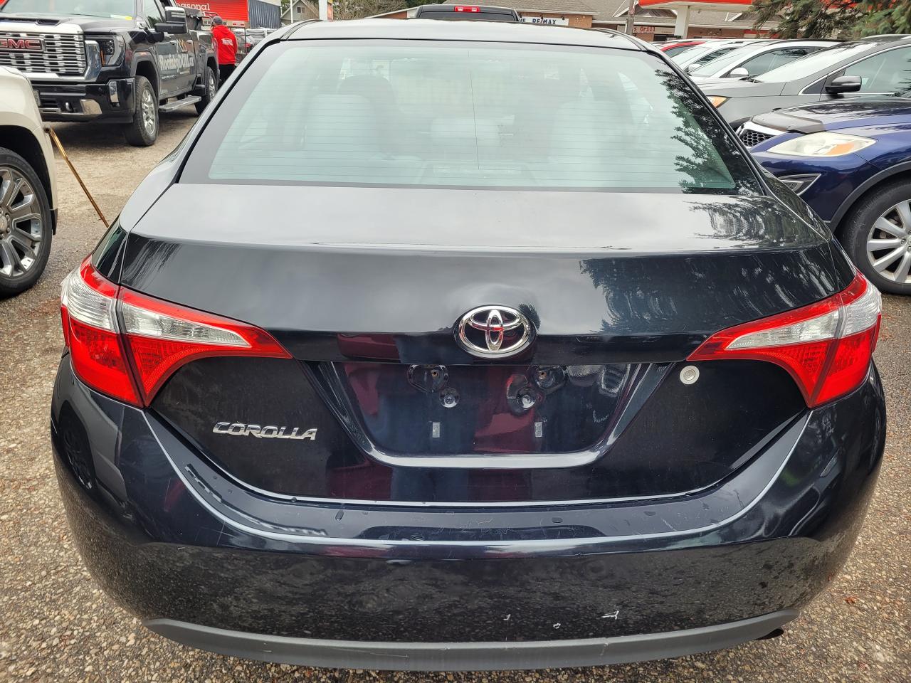 2014 Toyota Corolla 4dr Sdn Man CE Clean CarFax Financing Trades OK! Photo3