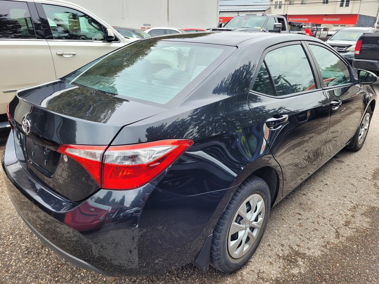 2014 Toyota Corolla 4dr Sdn Man CE Clean CarFax Financing Trades OK! Photo4