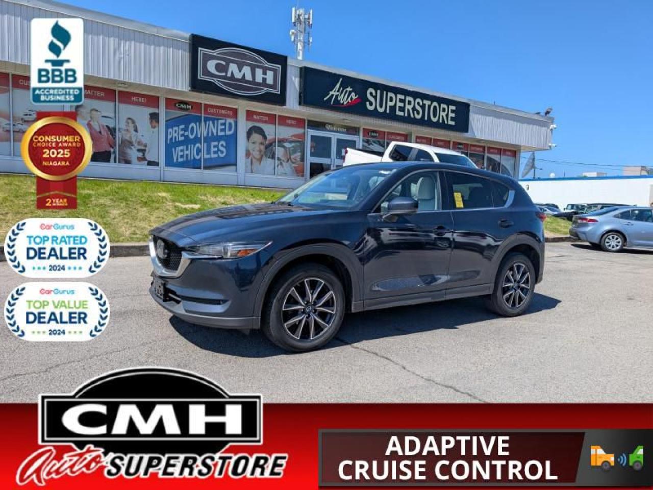 <b>GREAT SERVICE HISTORY !! AWD !! NAVIGATION, REAR CAMERA, HEADS UP DISPLAY, LANE ASSIST, ADAPTIVE CRUISE CONTROL, BOSE AUDIO, BLUETOOTH, SUNROOF, LEATHER, POWER SEATS W/DRIVER MEMORY, HEATED SEATS, DUAL CLIMATE CONTROL, POWER LIFTGATE<br></b><br>  <br>CMH certifies that all vehicles meet DOUBLE the Ministry standards for Brakes and Tires<br><br> <br>    This  2018 Mazda CX-5 is for sale today. <br> <br>The midsize crossover segment is packed with options, however there is one SUV that sets itself apart with phenomenal styling, a well tuned chassis and more features than you know what do with. The CX-5 looks and feels far more expensive than what it is, thanks to Mazdas Kodo design language, which gives it design lines youd expect from an expensive crossover. Inside, the cabin is filled in soft touch materials and is packed with high tech features. The hatch opens to plenty of cargo space for whatever you need to fill it with. This  SUV has 150,640 kms. Its  blue in colour  and is completely accident free based on the <a href=https://vhr.carfax.ca/?id=smXv9va5kylR7TDJv/g6DUEUDOT18dCh target=_blank>CARFAX Report</a> . It has an automatic transmission and is powered by a  187HP 2.5L 4 Cylinder Engine. <br> <br> Our CX-5s trim level is GT. This top of the line trim comes with a power liftgate, heated leather seats, LED front headlights, larger aluminum wheels, a 7 inch colour touch screen with MAZDA CONNECT, Bose premium audio system and a rear view camera. Additional features include advanced blind spot monitoring, smart city brake support, remote keyless entry with push button start, cruise control and a heated-leather steering wheel. For the ultimate in luxury, this GT trim also comes with a power sunroof, fully automatic and directionally adaptive headlights, dual zone automatic climate control, hands free proximity keys and built in navigation. This vehicle has been upgraded with the following features: Leather Seats,  Premium Audio,  Power Liftgate,  Navigation,  Heated Seats,  Heated Steering Wheel,  Aluminum Wheels. <br> <br>To apply right now for financing use this link : <a href=https://www.cmhniagara.com/financing/ target=_blank>https://www.cmhniagara.com/financing/</a><br><br> <br/><br>Trade-ins are welcome! Financing available OAC ! Price INCLUDES a valid safety certificate! Price INCLUDES a 60-day limited warranty on all vehicles except classic or vintage cars. CMH is a Full Disclosure dealer with no hidden fees. We are a family-owned and operated business for over 30 years! o~o
