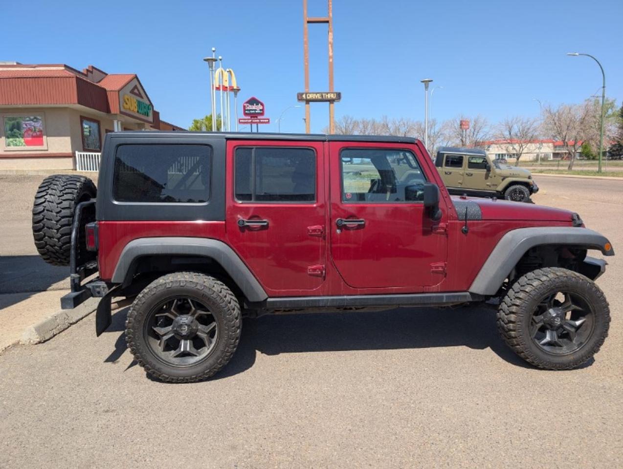 2011 Jeep Wrangler UNLIMITED SPORT Photo