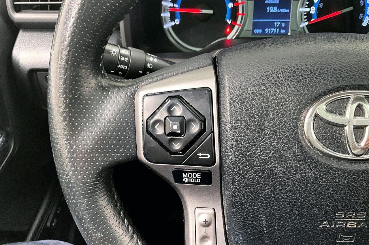 12409860
