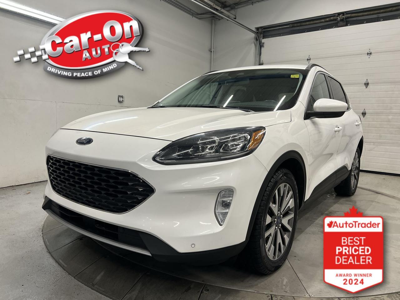 LOADED TITANIUM ALL-WHEEL DRIVE W/ 250HP 2.0L ECOBOOST!!! Leather, 8-inch touchscreen w/ navigation, heated seats & steering, remote start, blind spot monitor, rear cross-traffic alert, pre-collision system, lane keep assist, traffic sign recognition, adaptive cruise control w/ stop & go, backup camera w/ front & rear park sensors, 19-inch alloys, dual-zone climate control, automatic headlights w/ auto highbeams, keyless entry w/ push start, rain-sensing wipers, ambient lighting, power liftgate, full power group incl. power driver & passenger seats w/ driver memory, garage door opener, Bluetooth and Sirius XM!! *this car was a previous daily rental vehicle*