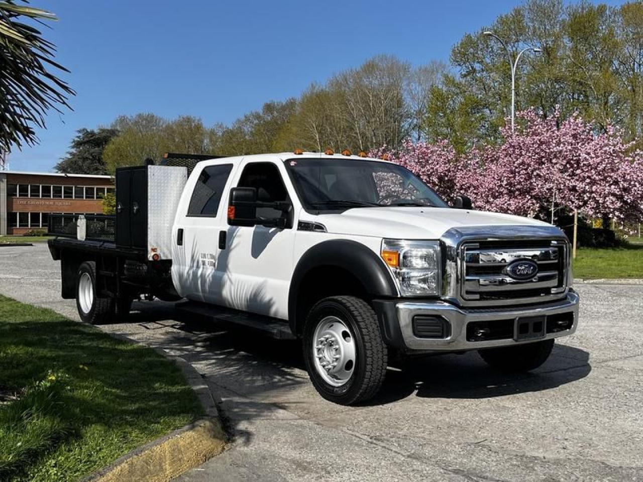 Used 2016 Ford F-550 12 Foot Flat Deck Crew Cab 4WD for sale in Burnaby, BC