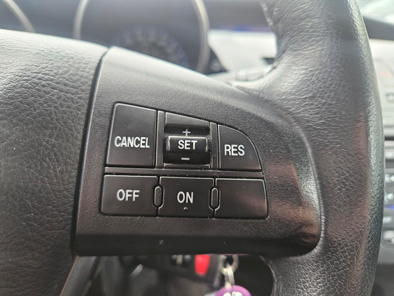 2012 Mazda MAZDA3 4dr HB Sport Man GS-SKY Photo