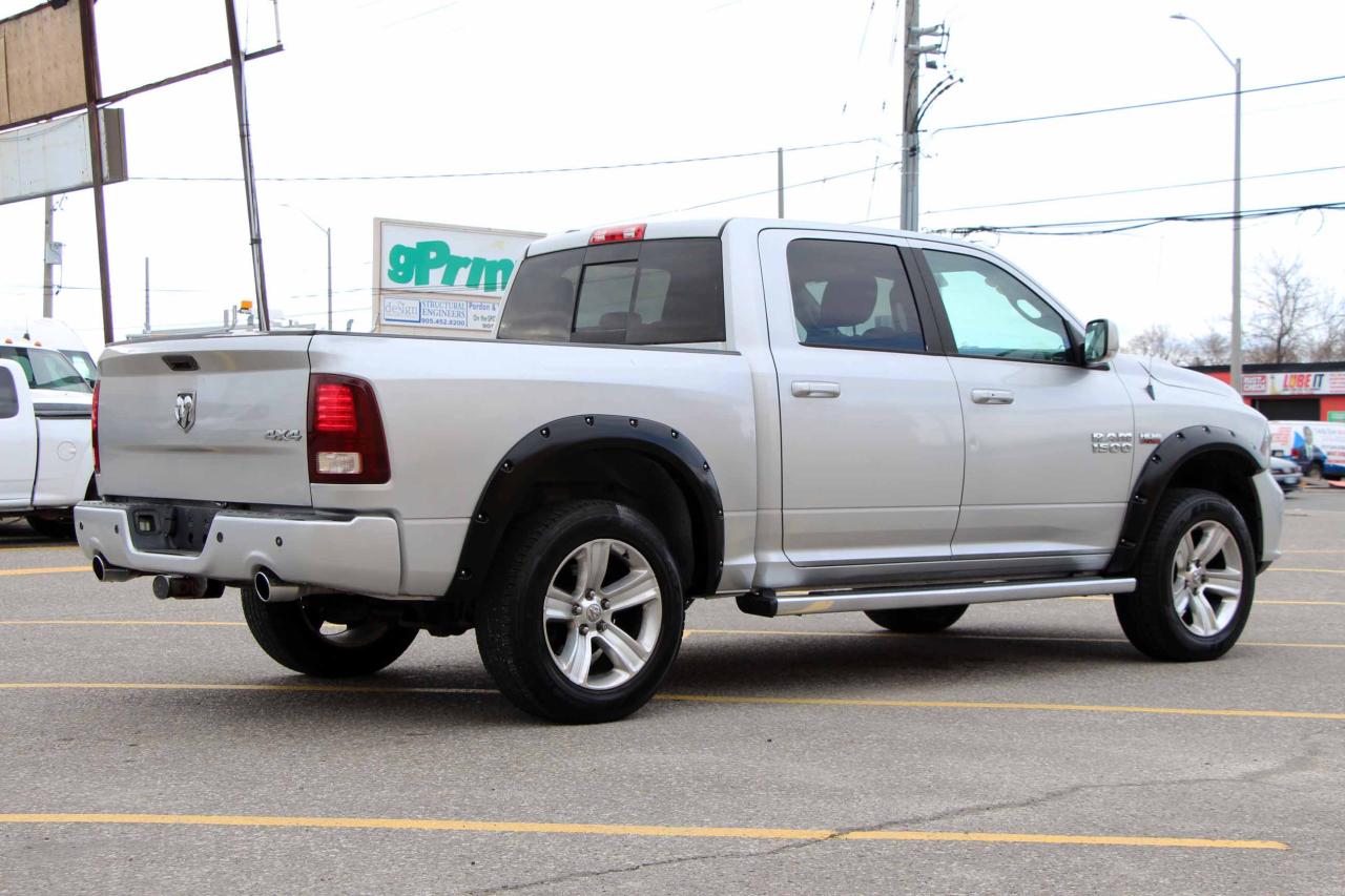2013 RAM 1500 4WD Crew Cab 140.5" Sport - Photo #7