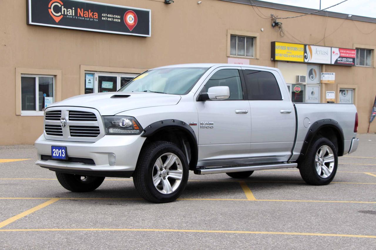 2013 RAM 1500 4WD Crew Cab 140.5" Sport - Photo #3
