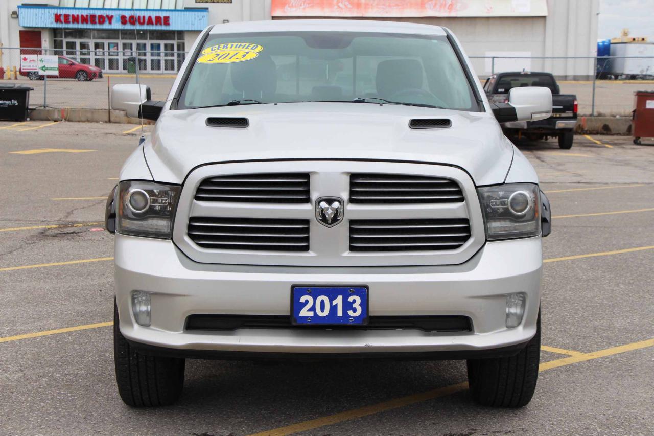 2013 RAM 1500 4WD Crew Cab 140.5" Sport - Photo #2