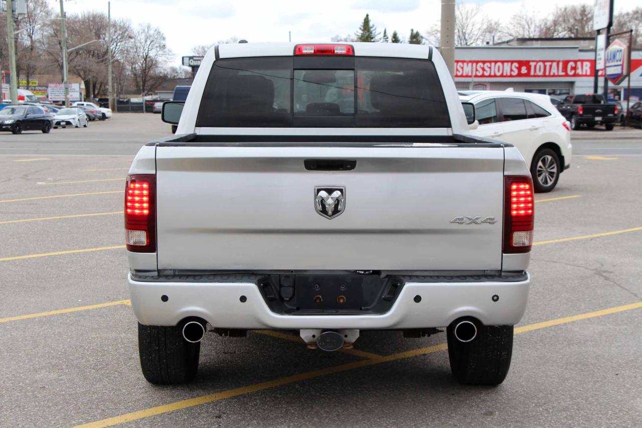 2013 RAM 1500 4WD Crew Cab 140.5" Sport - Photo #6