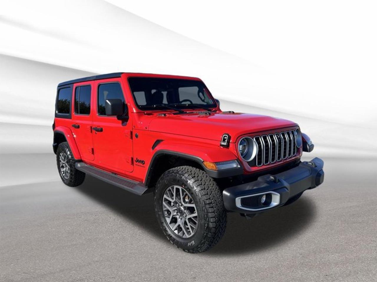 Experience the thrill of adventure with the brand new 2025 Jeep Wrangler Sahara, now available at Steele Halifax Chrysler Dodge Jeep Ram FIAT. This bold red SUV features a refined black interior and is engineered for both urban sophistication and rugged capability. With four doors, automatic transmission, and legendary four-wheel drive, its ready for any journey.FEATURES OF THE Wrangler SaharaSide steps for easy entry and exitAuto-dimming rearview mirror for night driving comfort2.0 L Intercooled Turbo I-4 engineDual overhead cam (DOHC) performance designADVANCED SAFETY FEATURESFour-wheel anti-lock braking systemAdvanced airbag protection throughout cabinElectronic stability control for confident handlingTire pressure monitoring systemPERFORMANCE AND EFFICIENCYIntercooled turbocharged 2.0 L gas engineAutomatic transmission for smooth shiftingFour-wheel drive for all-terrain capabilityEfficient power delivery for daily commutingCOMFORT AND CONVENIENCESpacious four-door configuration for easy accessAuto-dimming rearview mirror reduces glareConvenient side steps for passenger comfortAmple legroom for all occupantsTECHNOLOGY AND CONNECTIVITYModern dashboard with intuitive controlsIntegrated digital driver information displayHands-free phone capabilityMultiple USB charging portsCARGO SPACEFlexible rear cargo area for gearSplit-folding rear seats for larger itemsWide rear door for easy loadingAmple storage for outdoor adventure equipmentWHAT OTHER OWNERS LIKECapable four-wheel drive in all conditionsComfortable ride for daily drivingEasy access with side stepsTurbocharged engines responsive performanceThis 2025 Jeep Wrangler Saharas VIN is: 1C4PJXEN3SW583060.