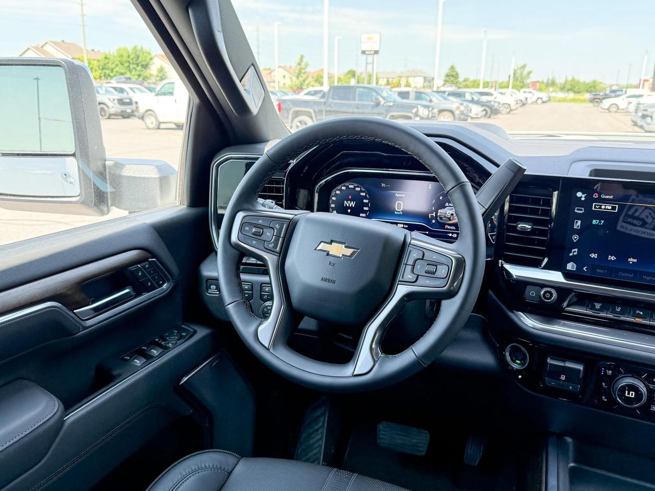 2025 Chevrolet Silverado 2500 HD High Country 6.6L DURAMAX WITH REMOTE START/ENTRY, SUNROOF, HEATED SEATS, HEATED STEERING WHEEL, VENTILATED SEATS, BOSE SOUND SYSTEM, POWER UP/DOWN TAILGATE Photo
