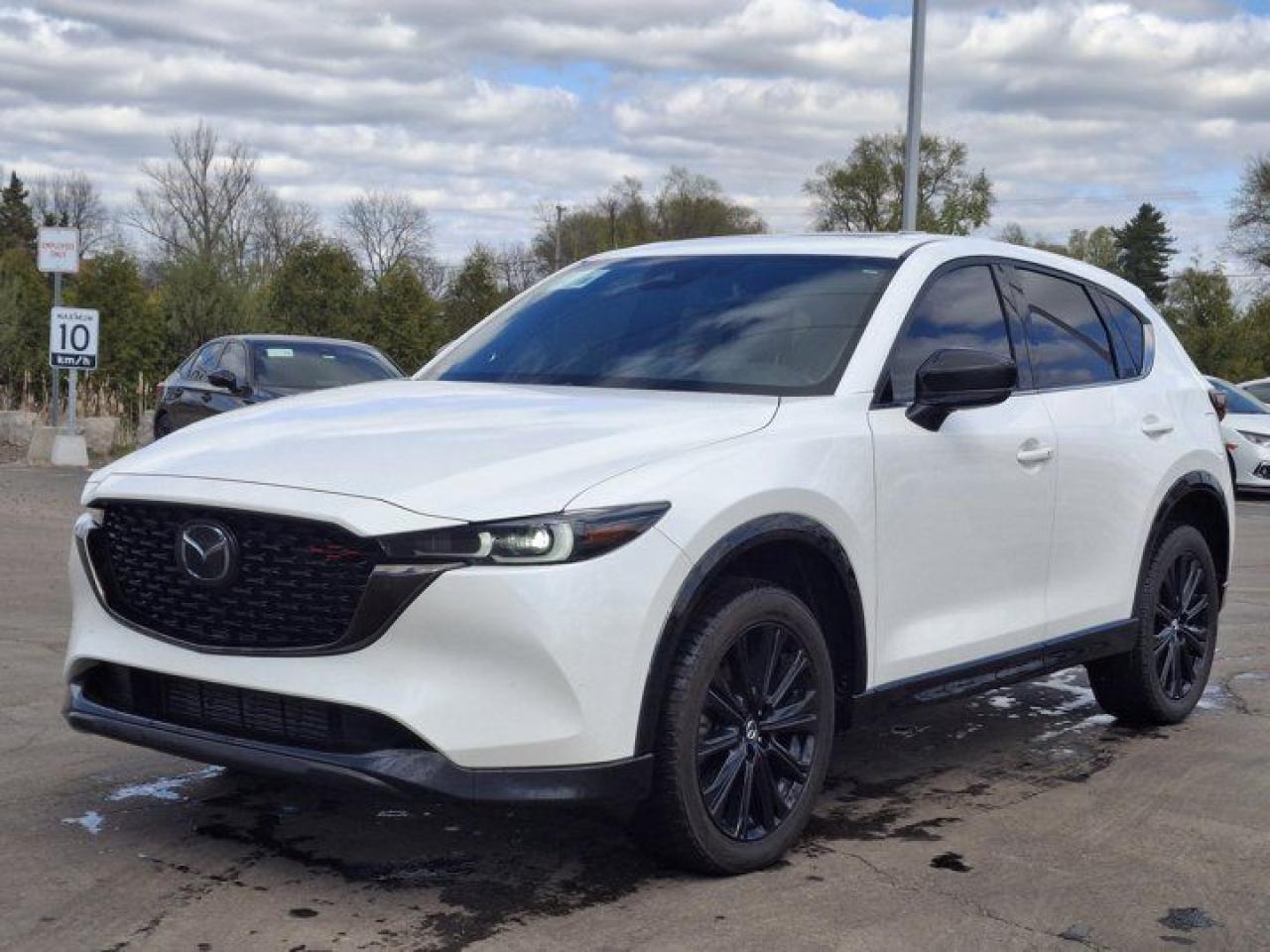 Come see this certified 2022 Mazda CX-5 Sport Design w/Turbo | Leather | Sunroof | HUD | Heated + Ventilated Seats | Heated Steering & More!. Its Automatic transmission and 2.5 L engine will keep you going. This Mazda CX-5 comes equipped with these options: Sunroof, Heated Steering Wheel, Heads Up Display, Air Conditioning, Heated Seats, Tilt Steering Wheel, Steering Radio Controls, Power Windows, Power Locks, and Traction Control. See it for yourself at Mark Wilsons Better Used Cars, 5055 Whitelaw Road, Guelph, ON N1H 6J4.60+ years of World Class Service!450+ Live Market Priced VEHICLES! ONE MASSIVE LOCATION!Free Local Delivery Available!FINANCING! - Better than bank rates! 6 Months No Payments available on approved credit OAC. Zero Down Available. We have expert licensed credit specialists to secure the best possible rate for you and keep you on budget ! We are your financing broker, let us do all the leg work on your behalf! Click the RED Apply for Financing button to the right to get started or drop in today!BAD CREDIT APPROVED HERE! - You dont need perfect credit to get a vehicle loan at Mark Wilsons Better Used Cars! We have a dedicated licensed team of credit rebuilding experts on hand to help you get the car of your dreams!WE LOVE TRADE-INS! - Top dollar trade-in values!SELL us your car even if you dont buy ours! HISTORY: Free Carfax report included.Certification included! No shady fees for safety!EXTENDED WARRANTY: Available30 DAY WARRANTY INCLUDED: 30 Days, or 3,000 km (mechanical items only). No Claim Limit (abuse not covered)5 Day Exchange Privilege! *(Some conditions apply)CASH PRICES SHOWN: Excluding HST and Licensing Fees.2019 - 2024 vehicles may be daily rentals. Please inquire with your Salesperson.We have made every reasonable attempt to ensure options are correct but please verify with your sales professional