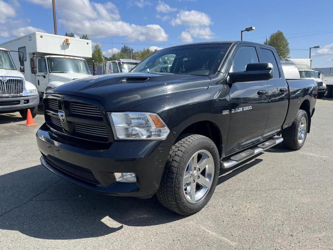 Used 2011 RAM 1500 SPORT QUAD CAB 4WD for sale in Burnaby, BC