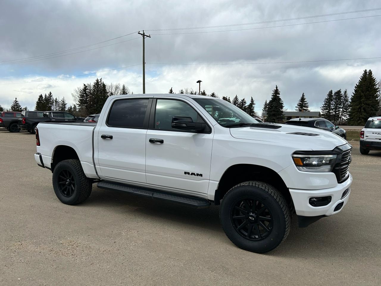2023 RAM 1500 Laramie 4x4 Crew Cab 5'7" Box - Photo #2