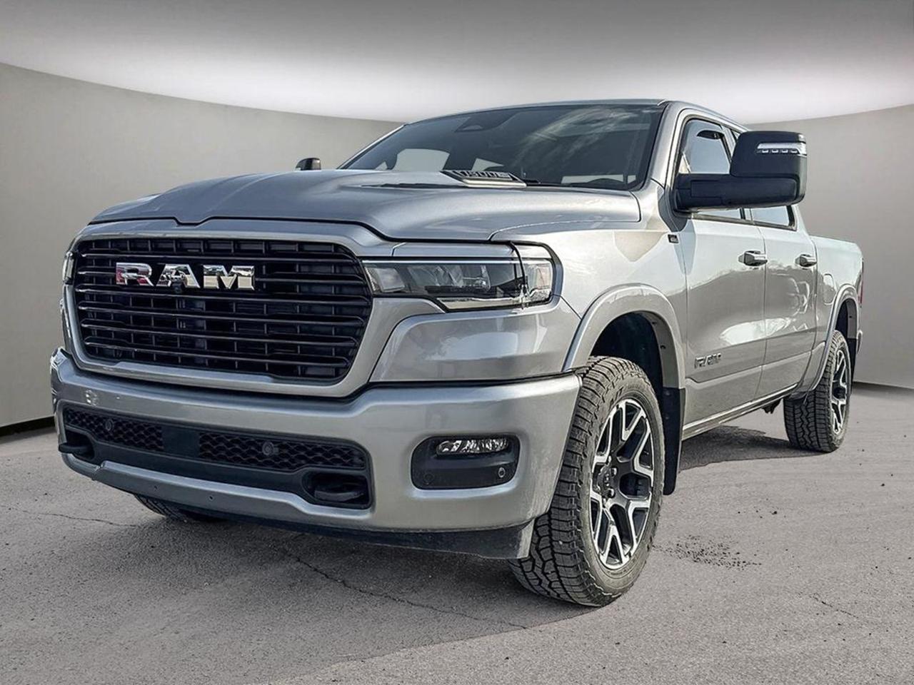 2025 RAM 1500 LARAMIE HIGHLIGHTSCrewcabSport Appearance groupOff-road GroupDual Pane Panoramic SunroofMulti-function tailgateTrailer Tow GroupLaramie Level 1 equipmentHeated/Ventilated seatsHeated steering