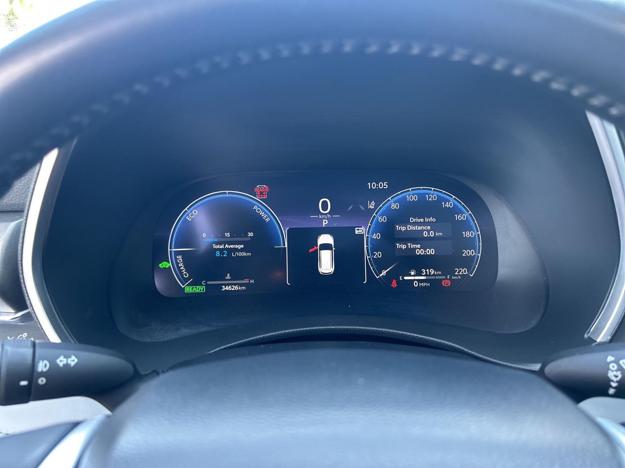 12449977