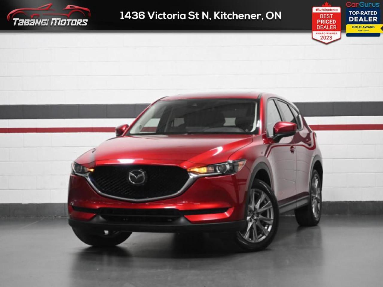 <b>Apple Carplay, Android Auto, Sunroof, Heated Seats & Steering Wheel, Lane Keep Assist, Blind Spot, Adaptive Cruise Control, Smart Brake Support!<br></b><br>  Tabangi Motors is family-owned and operated for over 20 years and is a trusted member of the UCDA. Our goal is not only to provide you with the best price, but, more importantly, a quality, reliable vehicle and the best customer service. Serving the Kitchener area, Tabangi Motors is your premier retailer of pre-owned vehicles. Our dedicated sales staff and top-trained technicians are here to make your auto shopping experience fun, easy, and financially advantageous. Please utilize our various online resources and allow our excellent network of people to put you in your ideal car, truck, or SUV today! <br><br>Tabangi Motors treats the needs of each customer with paramount concern. We know that you have high expectations, and as a car dealer, we enjoy the challenge of meeting and exceeding those standards every time. Allow us to demonstrate our commitment to excellence! Call us at 905-670-3738 or email us at customercare@tabangimotors.com to book an appointment. <br><hr></hr>CERTIFICATION: Have your new pre-owned vehicle certified at Tabangi Motors! We offer a full safety inspection exceeding industry standards, including oil change and professional detailing before delivery. Vehicles are not drivable if they are not certified. The certification package is available for $595 on qualified units (Certification is not available on vehicles marked As-Is). All trade-ins are welcome. Taxes and licensing are extra.<br><hr></hr><br> <br>   The 2021 Mazda CX-5s athletic handling, precise steering, and upscale cabin are just some of the reasons why it ranks near the top of the compact SUV class. This  2021 Mazda CX-5 is for sale today in Kitchener. <br> <br>The 2021 CX-5 strengthens the connection between vehicle and driver. Mazda designers and engineers carefully consider every element of the vehicles makeup to ensure that the CX-5 outperforms expectations and elevates the experience of driving. Powerful and precise, yet comfortable and connected, the 2021 CX-5 is purposefully designed for drivers, no matter what the conditions might be. This  SUV has 58,375 kms. Its  red in colour  . It has a 6 speed automatic transmission and is powered by a  187HP 2.5L 4 Cylinder Engine.  It may have some remaining factory warranty, please check with dealer for details.  This vehicle has been upgraded with the following features: Air, Rear Air, Tilt, Cruise, Power Windows, Power Locks, Power Mirrors. <br> <br>To apply right now for financing use this link : <a href=https://kitchener.tabangimotors.com/apply-now/ target=_blank>https://kitchener.tabangimotors.com/apply-now/</a><br><br> <br/><br><hr></hr>SERVICE: Schedule an appointment with Tabangi Service Centre to bring your vehicle in for all its needs. Our licensed technicians and repair facility offer the highest-quality services at the most competitive prices. All work is manufacturer warranty approved and comes with a 2-year parts and labour warranty. Start saving hundreds of dollars by servicing your vehicle with Tabangi. Call us at 905-670-8100 or follow this link to book an appointment today! PRICE: Everyone deserves the best price on their new pre-owned vehicle without uncomfortable negotiations. By constantly monitoring the market and adjusting our prices below the market average, you can buy confidently knowing you are getting the best price possible! No haggle pricing. No pressure. Why pay more somewhere else?<br><hr></hr>WARRANTY: This vehicle qualifies for an extended warranty with different terms and coverages available. Dont forget to ask for help choosing the right one for you.<br><hr></hr>FINANCING: No credit? New to the country? Bankruptcy? Consumer proposal? Collections? You dont need good credit to finance a vehicle. Bad credit is usually good enough. Give our finance and credit experts a chance to get you approved and start rebuilding credit today!<be> o~o