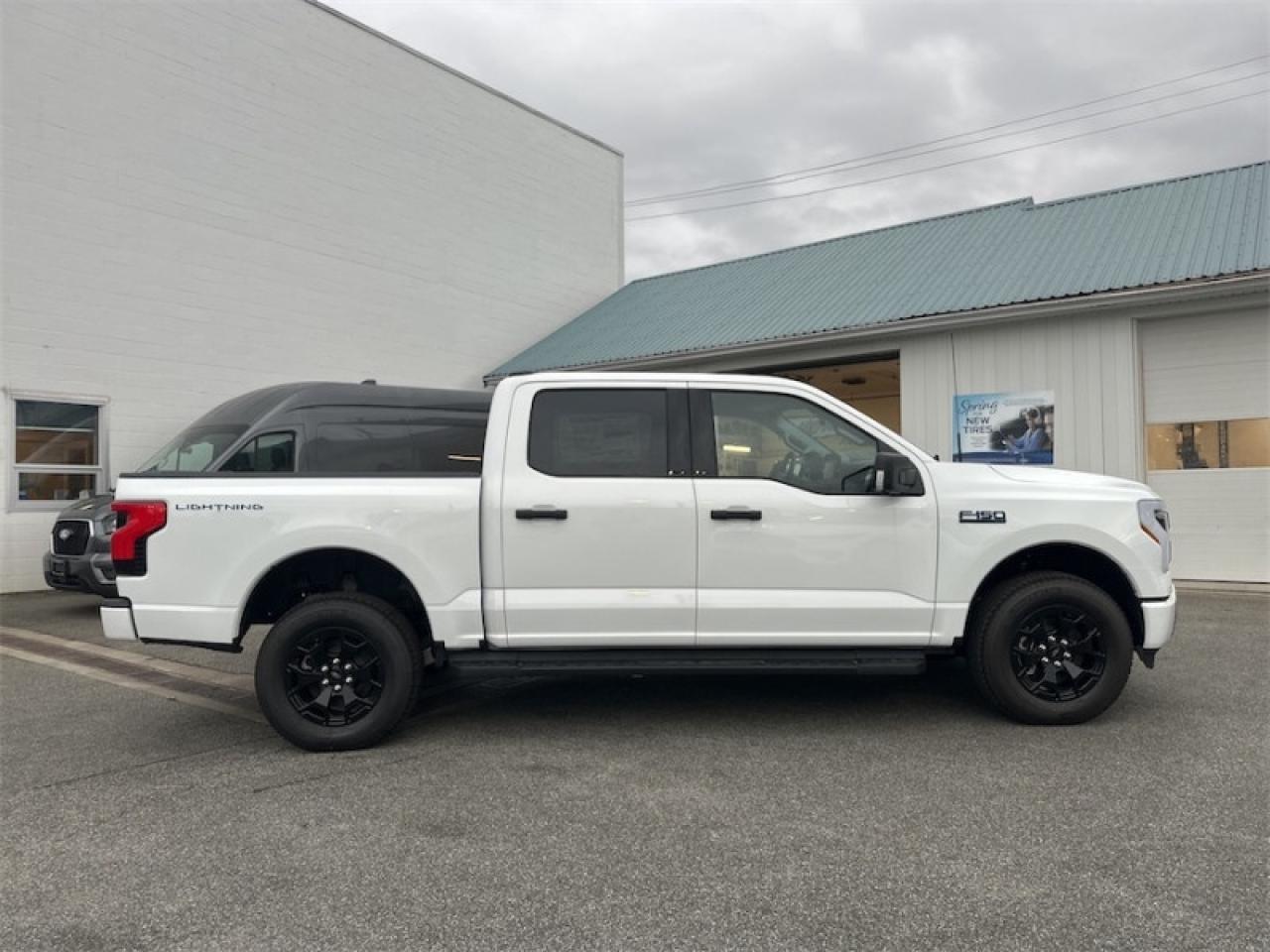2025 Ford F-150 Lightning XLT  - Tailgate Step Photo5