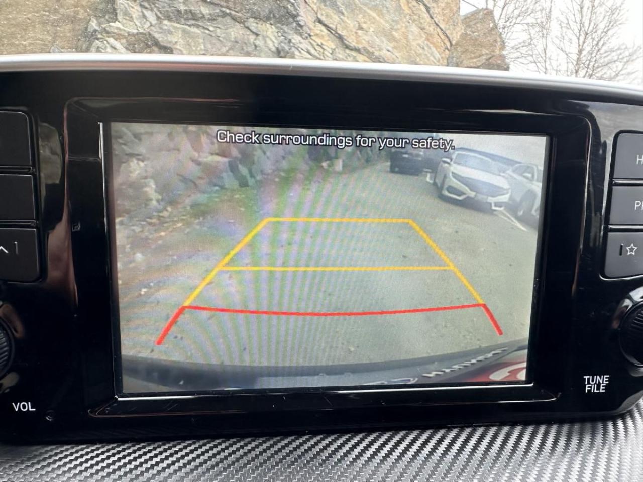 12457128