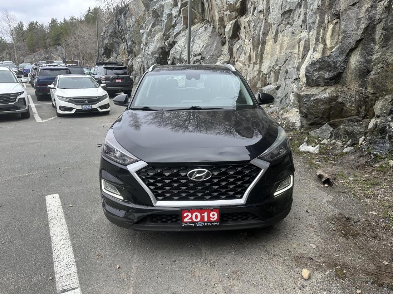 12457128